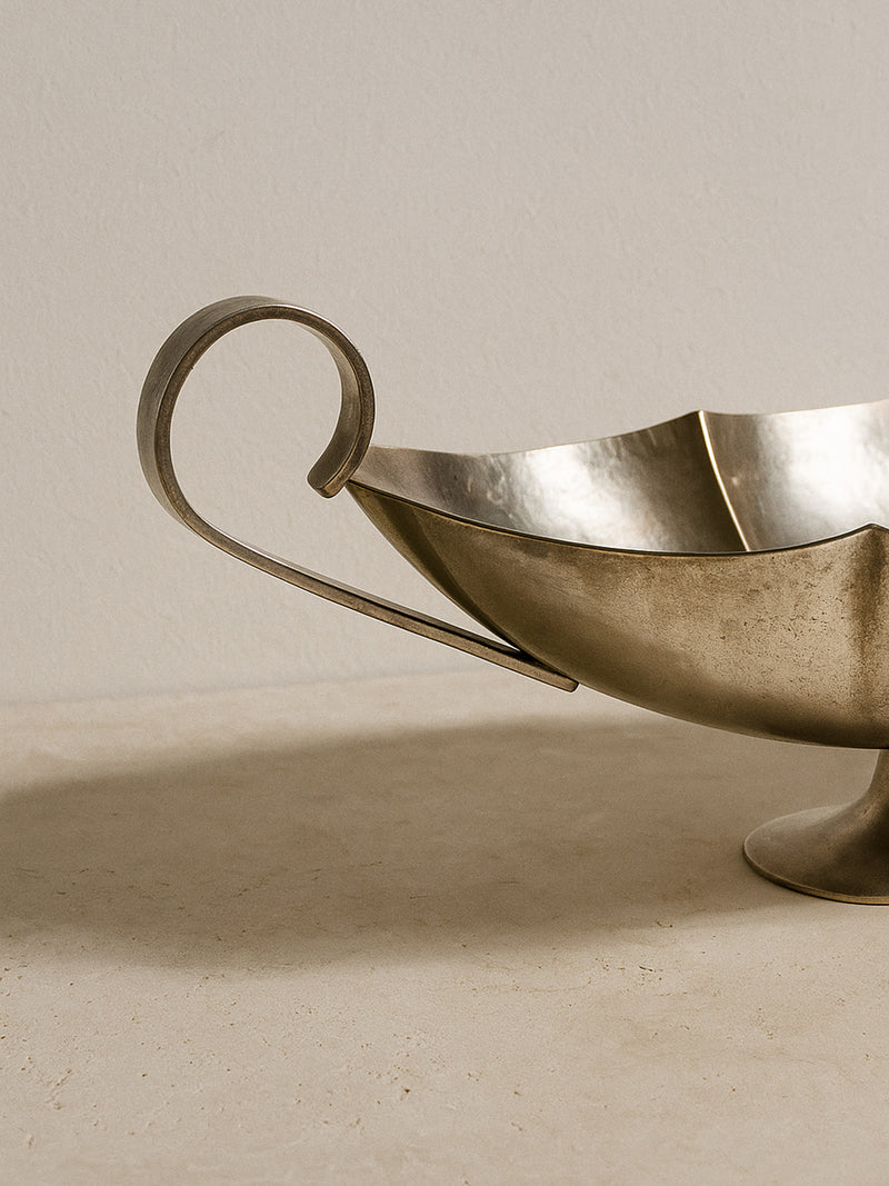 Italian silver-plated serving bowl profile view with curved handle