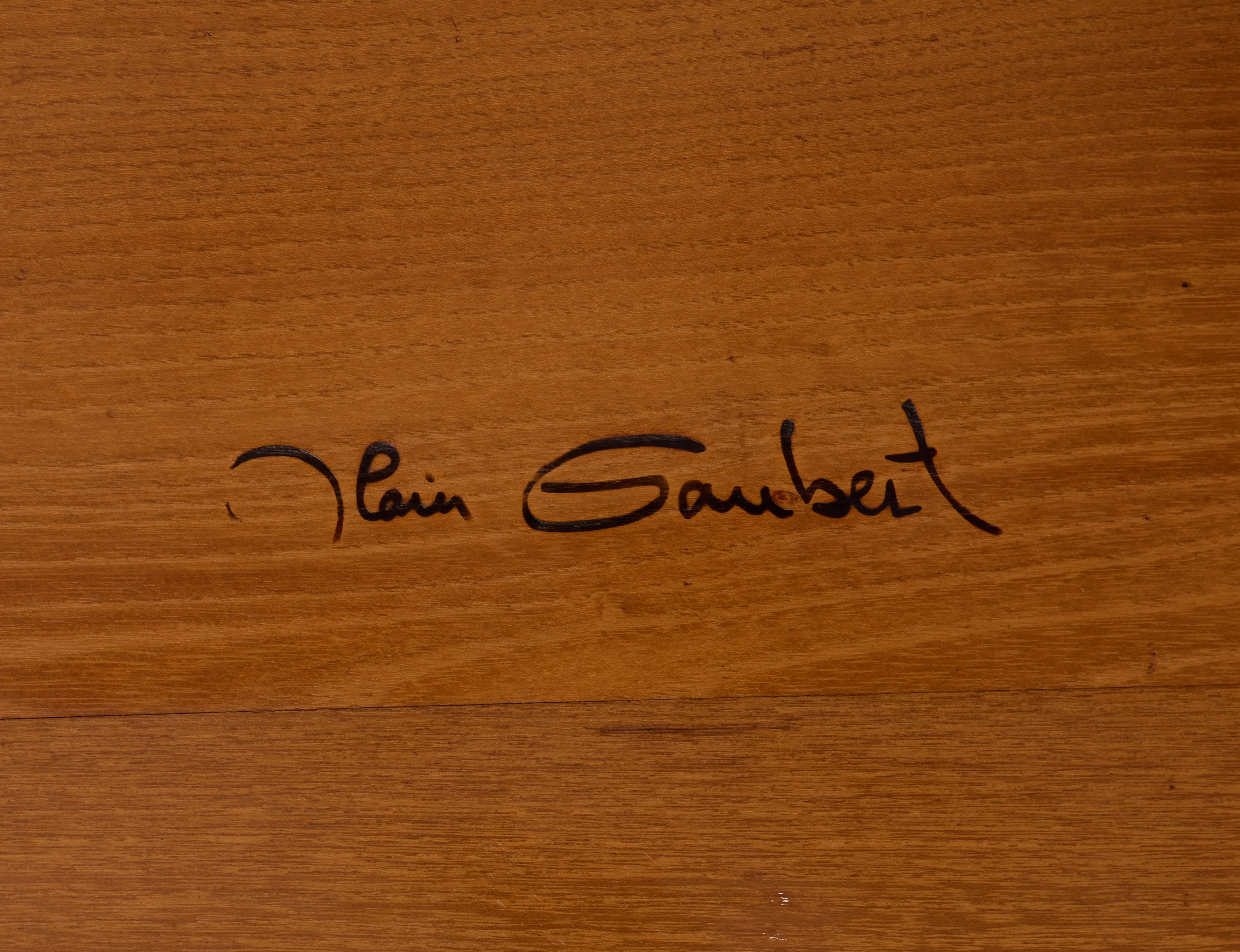 Solid elm coffee table by Alain Gaubert, France circa 1980 — close-up of signature on wood surface