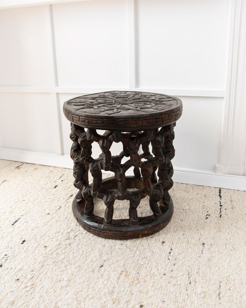 Hand-Carved Stool from Cameroon 1950s — angled view of dark wood craftsmanship