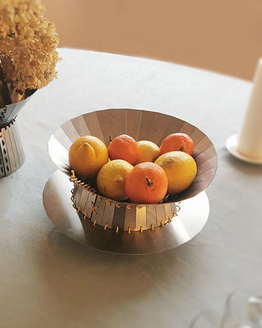 Mina - Centerpiece — side angle showing metallic bowl with fruit
