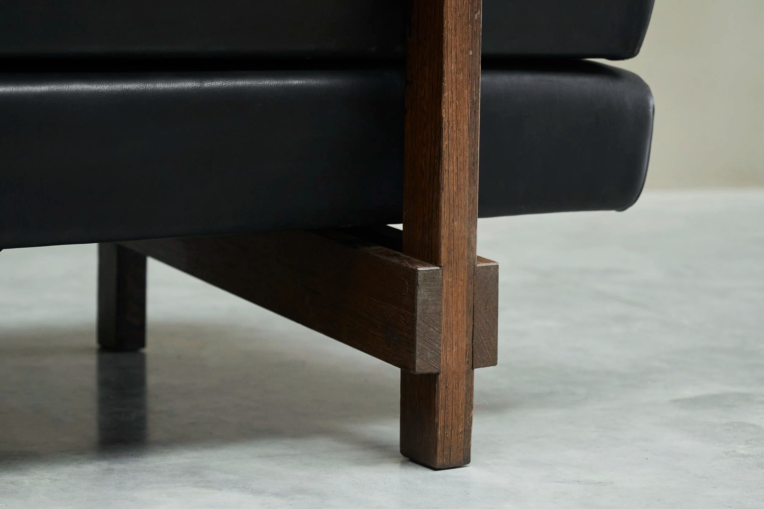 Martin Visser One-Off Boomerang Sofa in Solid Wengé and Black Leather — in context