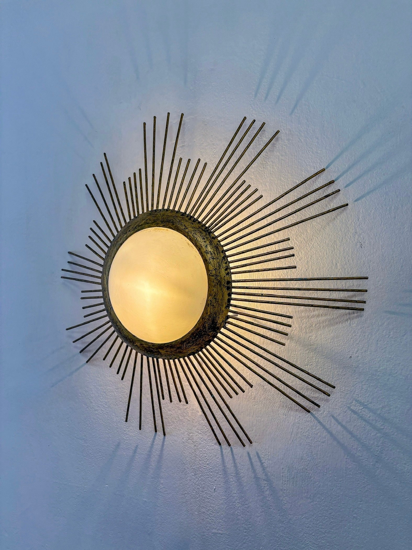 Large Sunburst Brutalist Ceiling Flush Mount or Pendant – Gilt Iron Rays & Opaline, France, 1950s — lifestyle setting