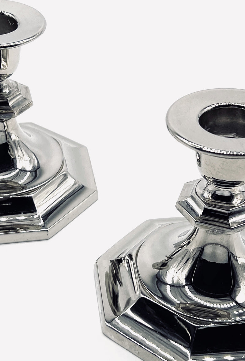 Polished silver vintage candleholders with octagonal bases detail
