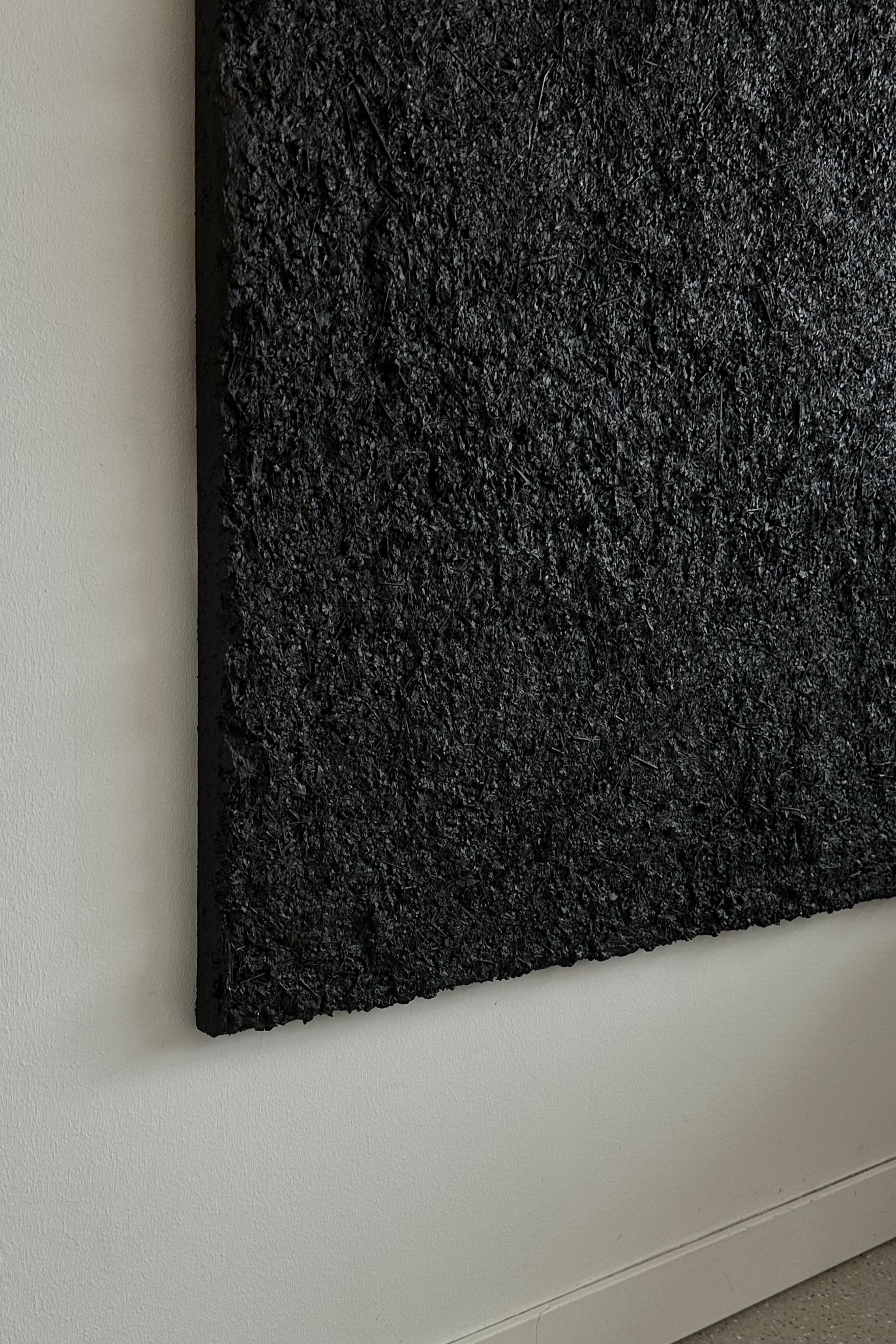 ARCHE 06' sculptural wall art — side view of textured black surface