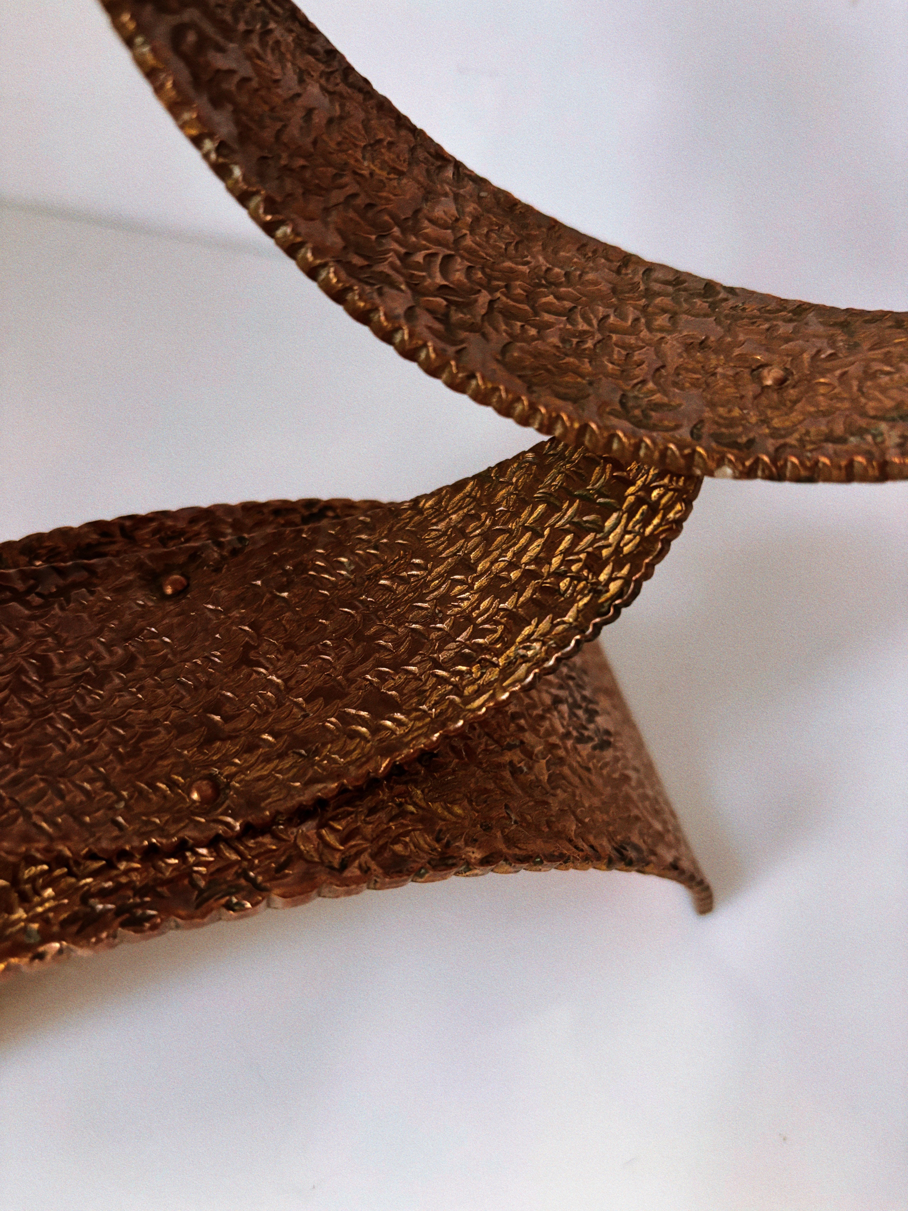 Mid Century Hammered Metal Candlestick, Poland — close-up of textured bronze surface