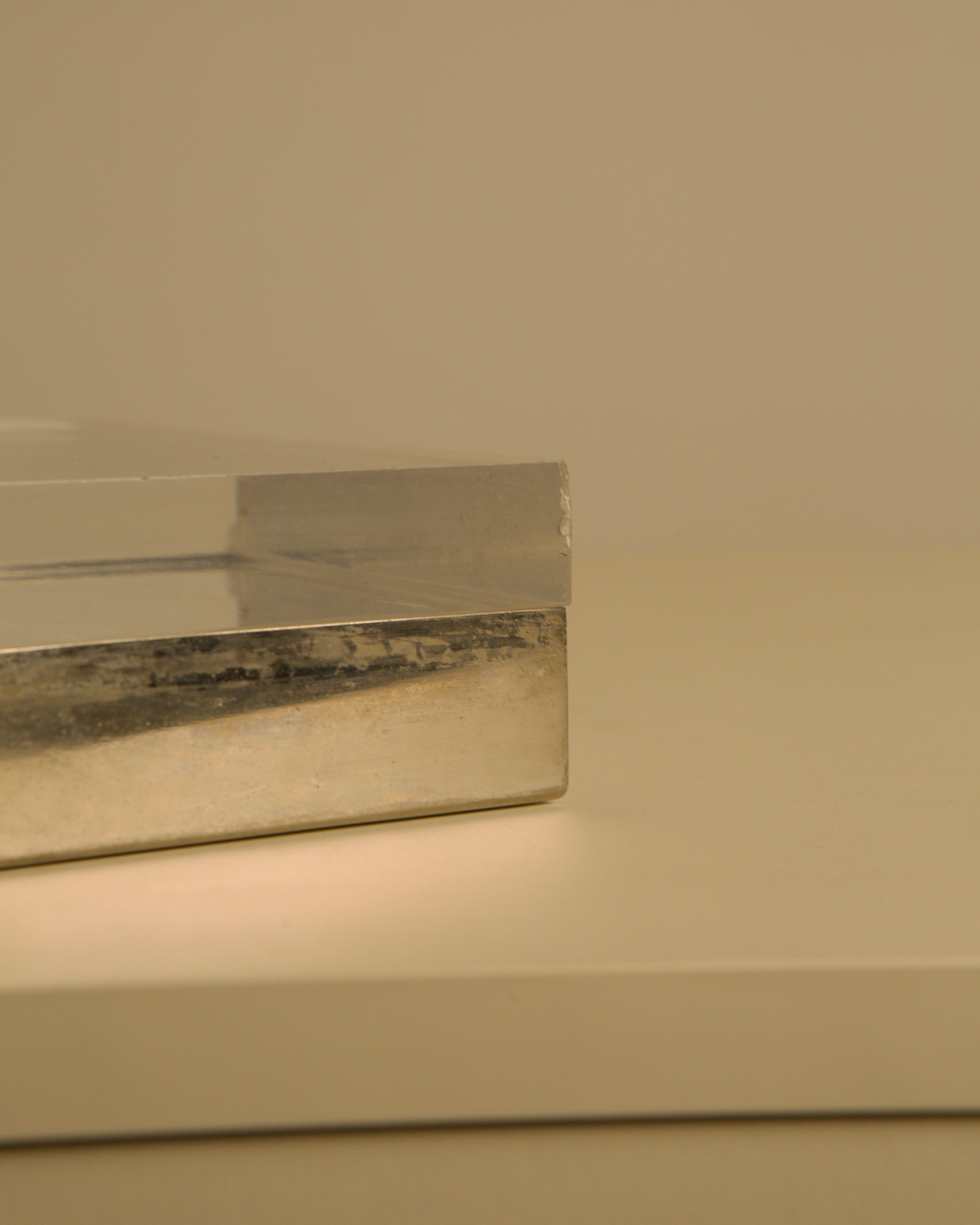 Rectangular Italian Box in Silver and Plexiglass, 1970s — angled view highlighting silver base and clear top