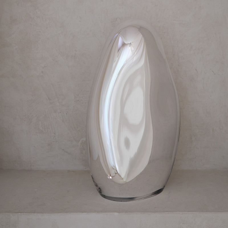 Standing Mirror Glass Sculpture No. 21 | color silver — close-up of reflective surface on neutral background