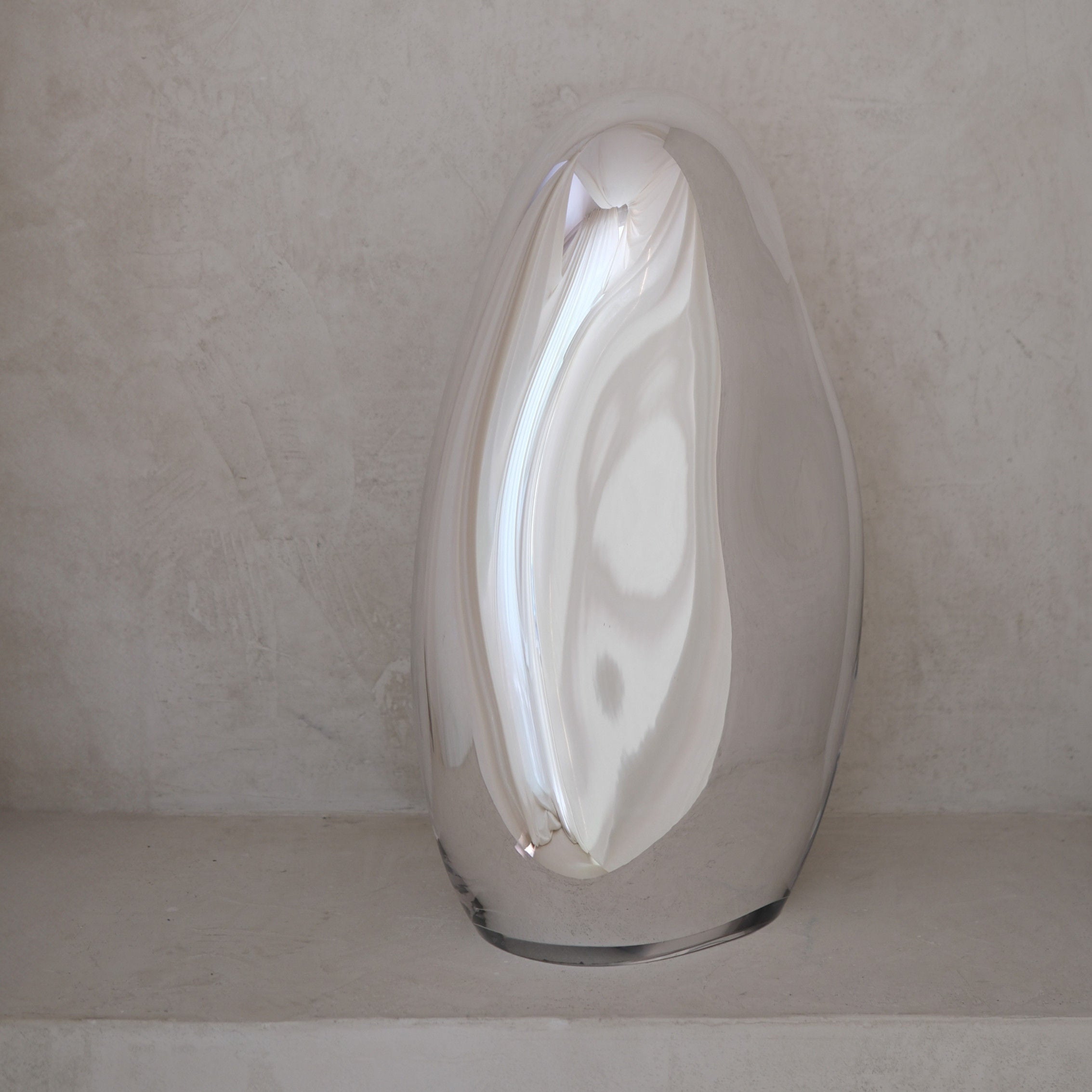 Standing Mirror Glass Sculpture No. 21 | color silver — close-up of reflective surface on neutral background