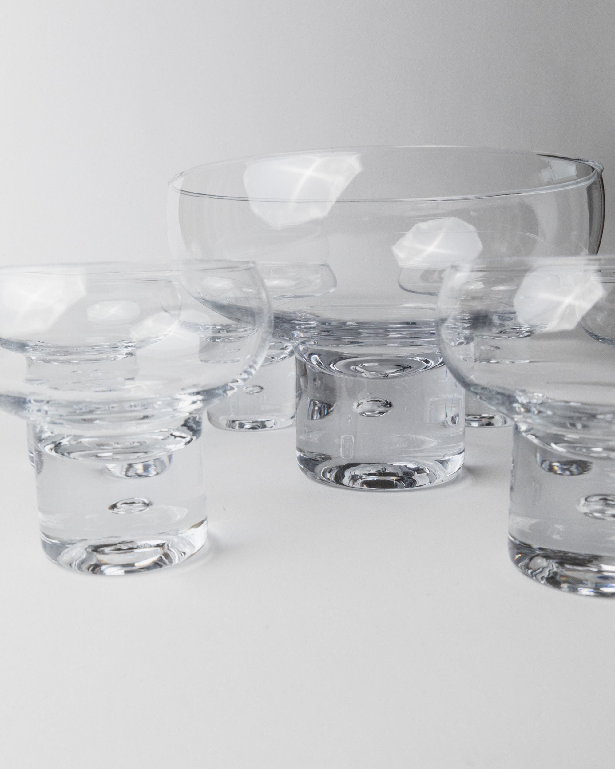 Set of 6 Glasses and 1 Bowl by Vicke Lindstrand, Italy 1960s — back view highlighting clear glass design