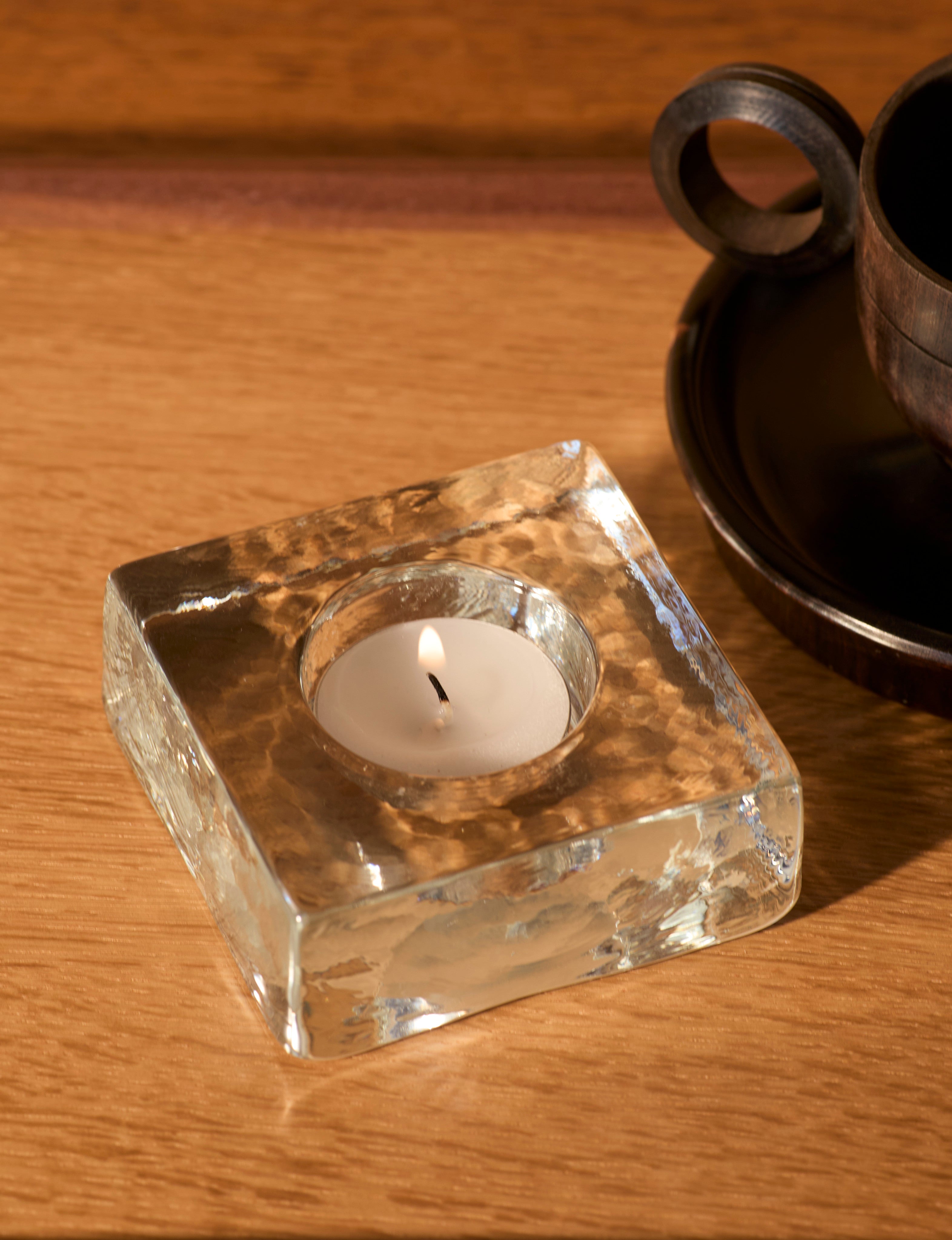 Clear glass candle holder in European glass  — detail view