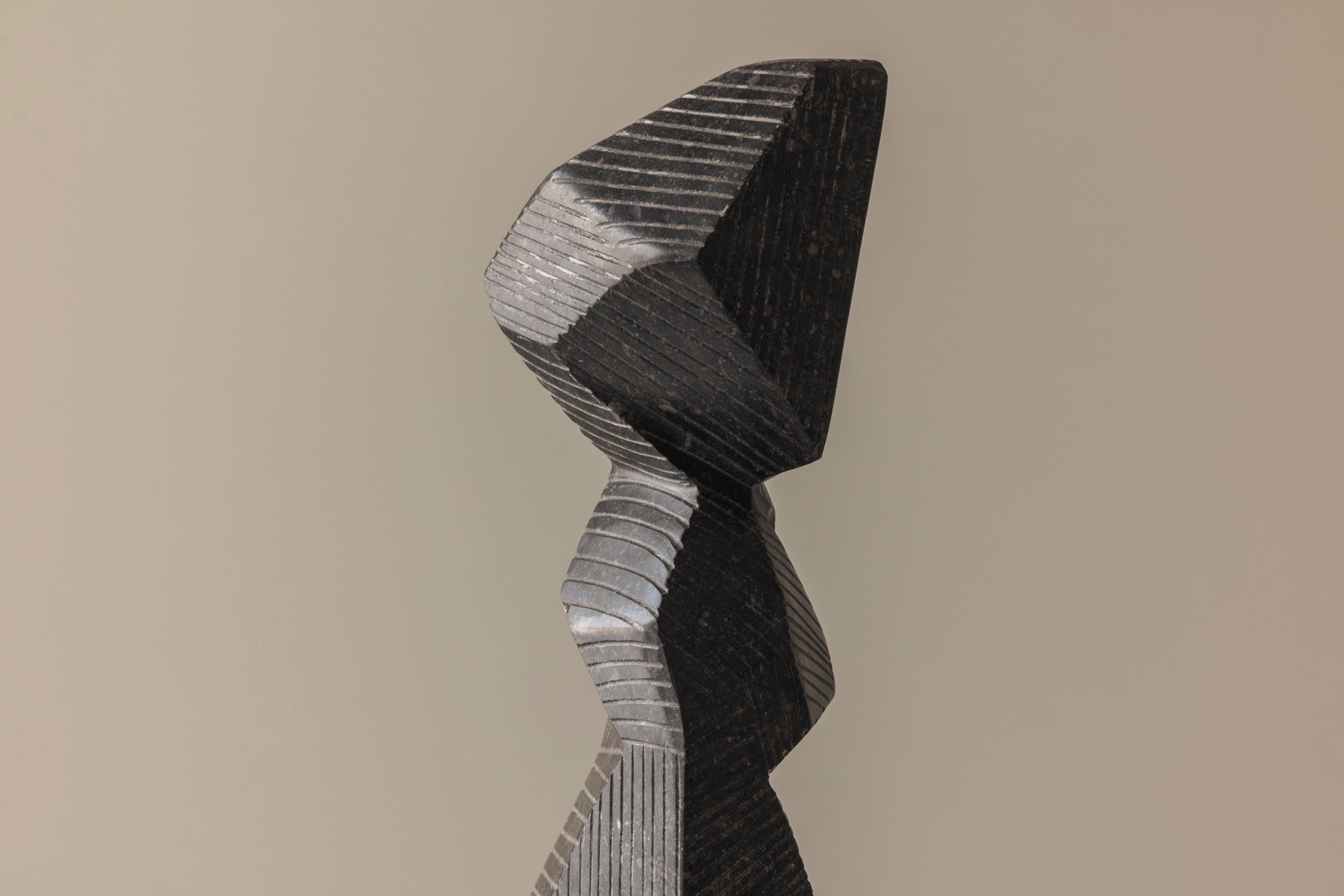 Abstract sculpture Carved from natural stone by Marc Verdoodt, Belgium 1980s. — side angle