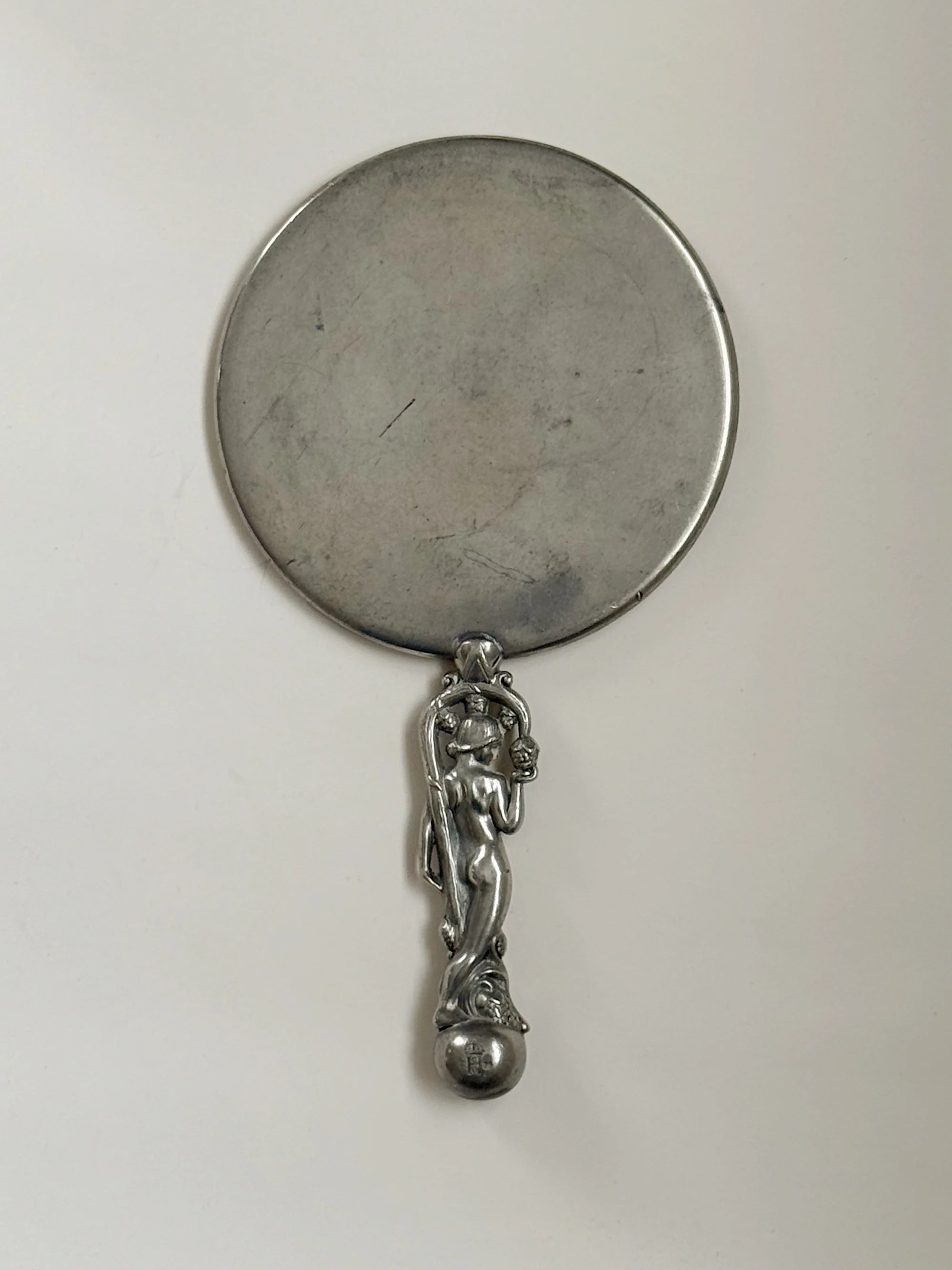 CG Hallberg Hand Mirror in Pewter, Swedish Grace, 1933 — back view highlighting the detailed handle design