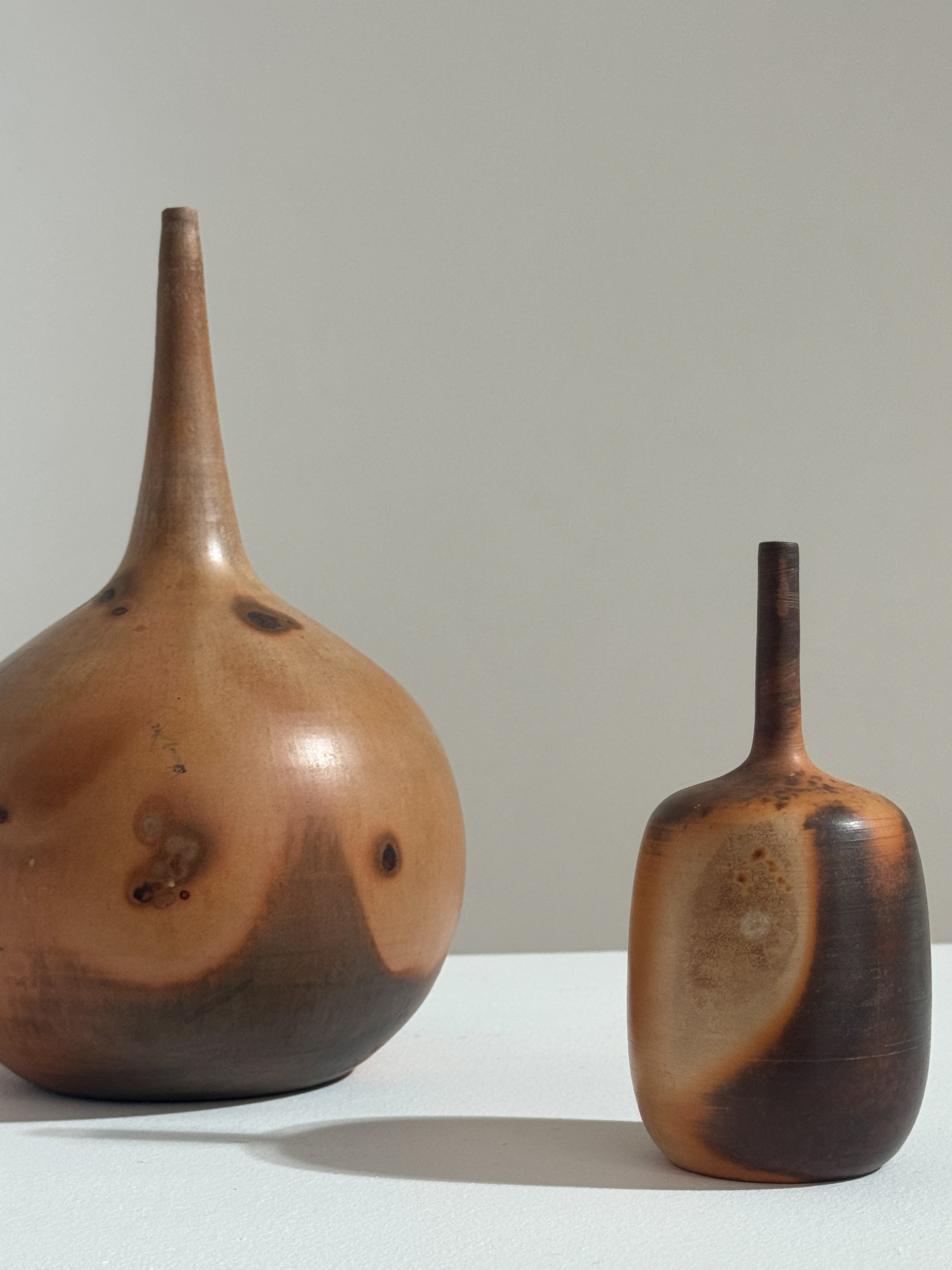 Two ceramic soliflore vases by Pierre Bayle with organic forms