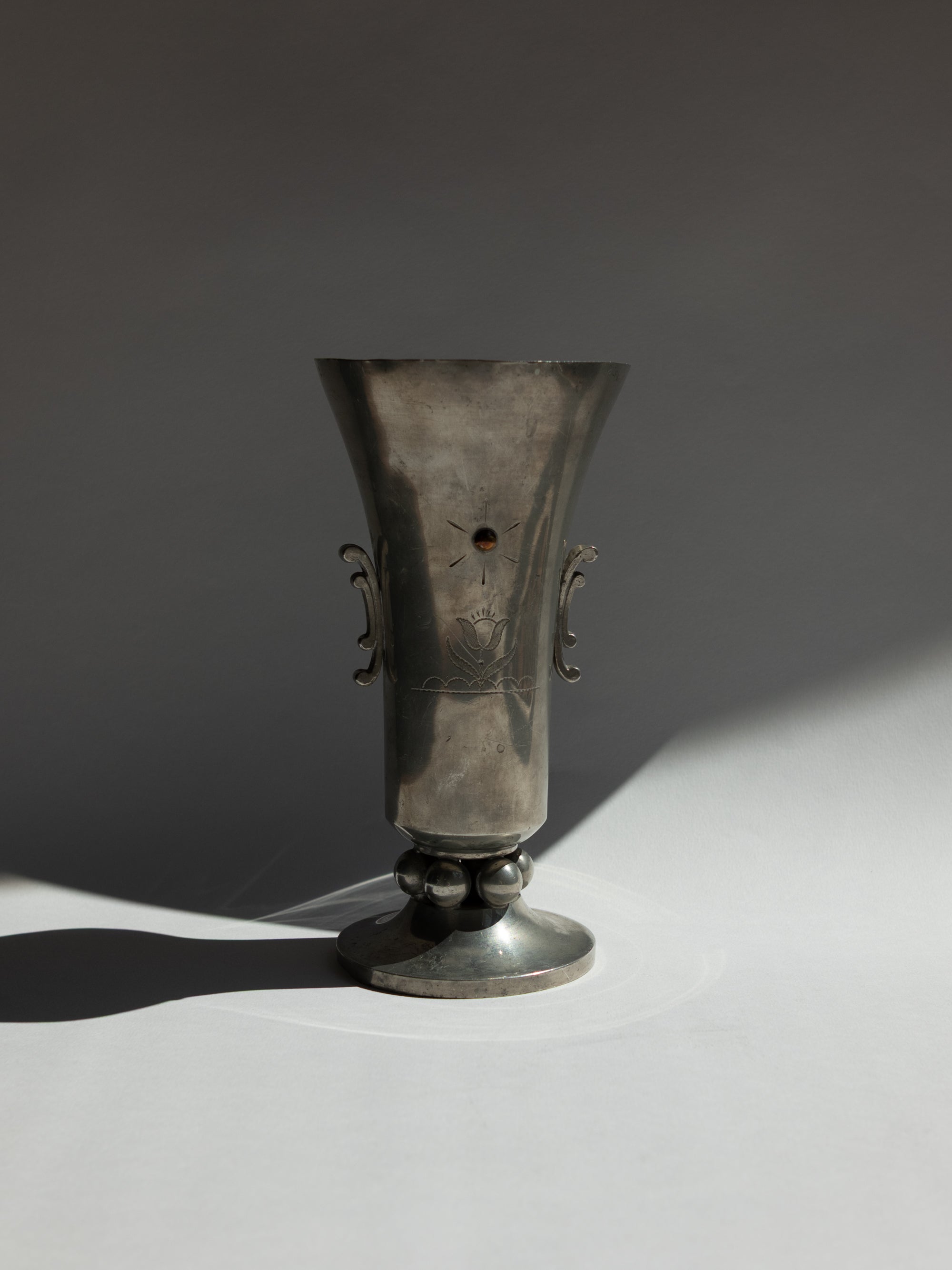Swedish Grace Pewter Sunburst & Tulip Vase by J.L. Hultman for Svenskt Tenn — detail view