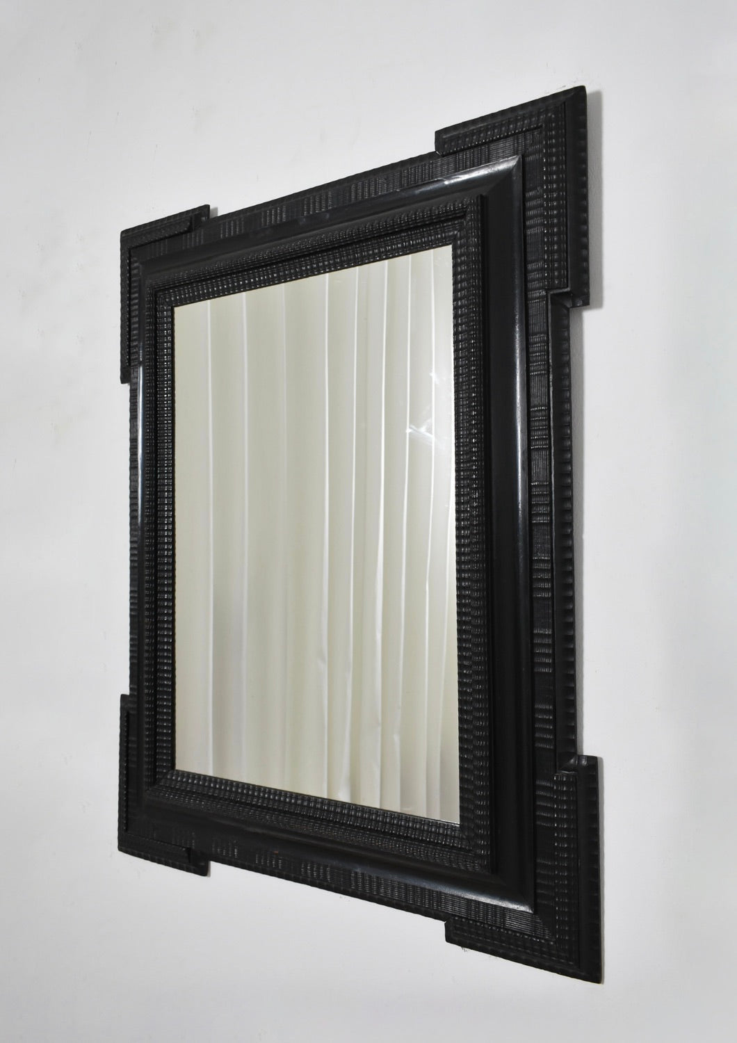 Carved ebonised wooden mirror, XIXth c. by Barracuda Interiors | The Oblist