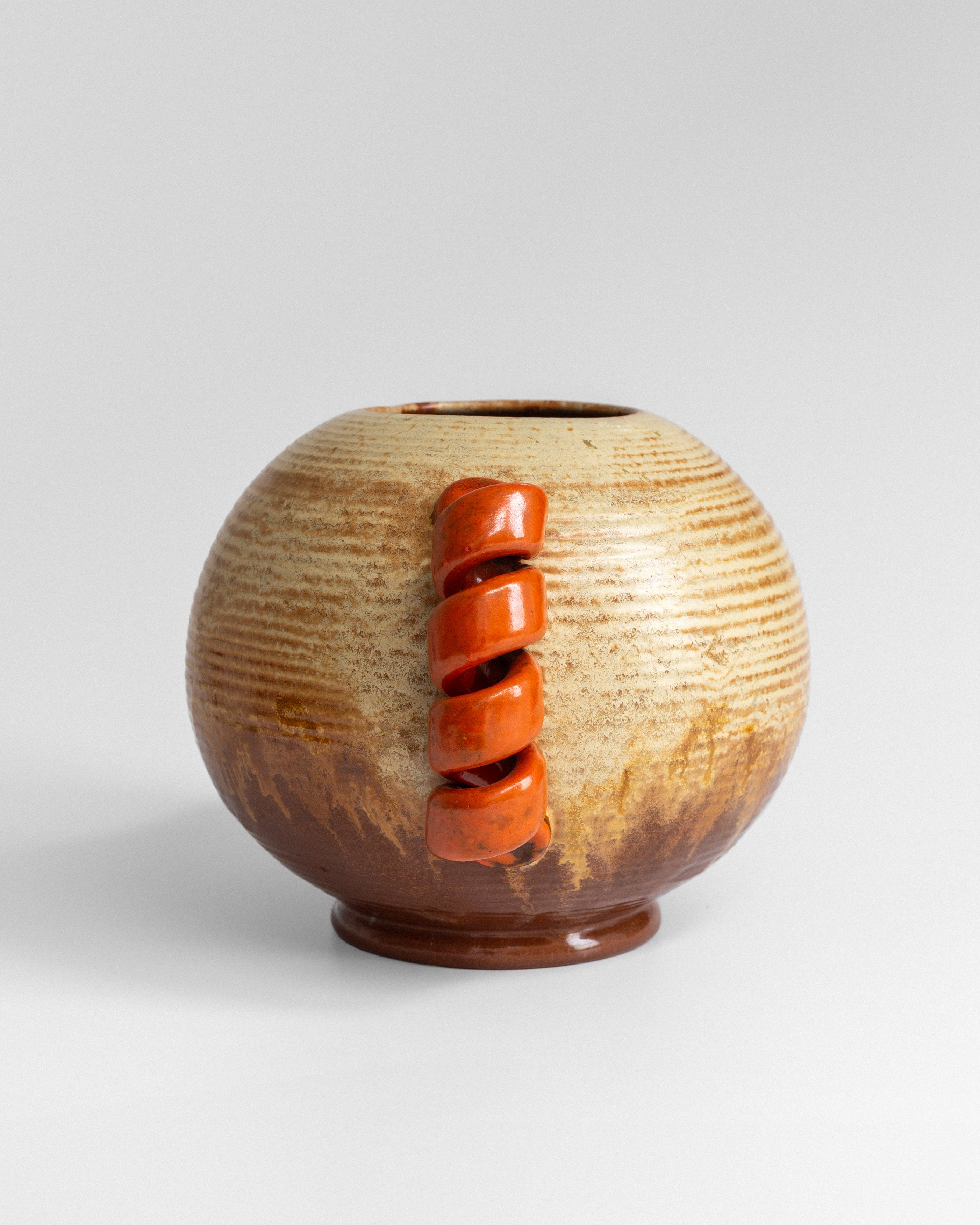Swedish Modernist Vase with Sculptural Handles — side view highlighting ceramic texture and orange handle