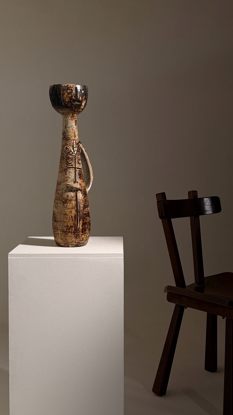 Monumental anthropomorphic pitcher by Jacques Pouchain — side view on white pedestal