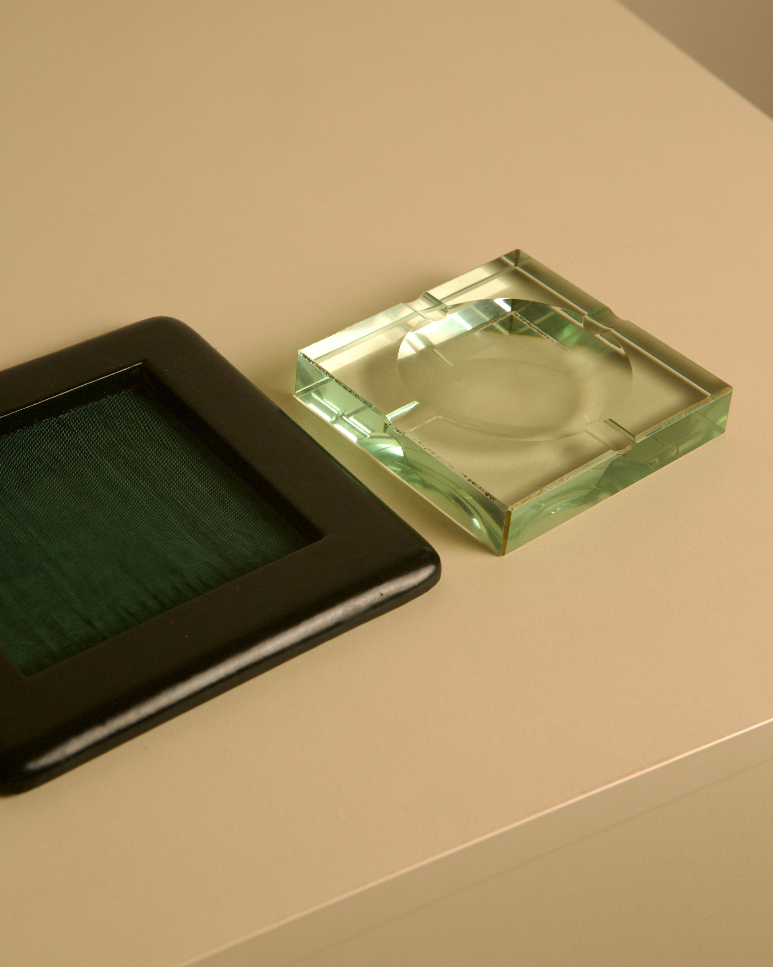 Square Italian Ashtray by Fontana Arte, 1960s — side angle showing green glass and black base
