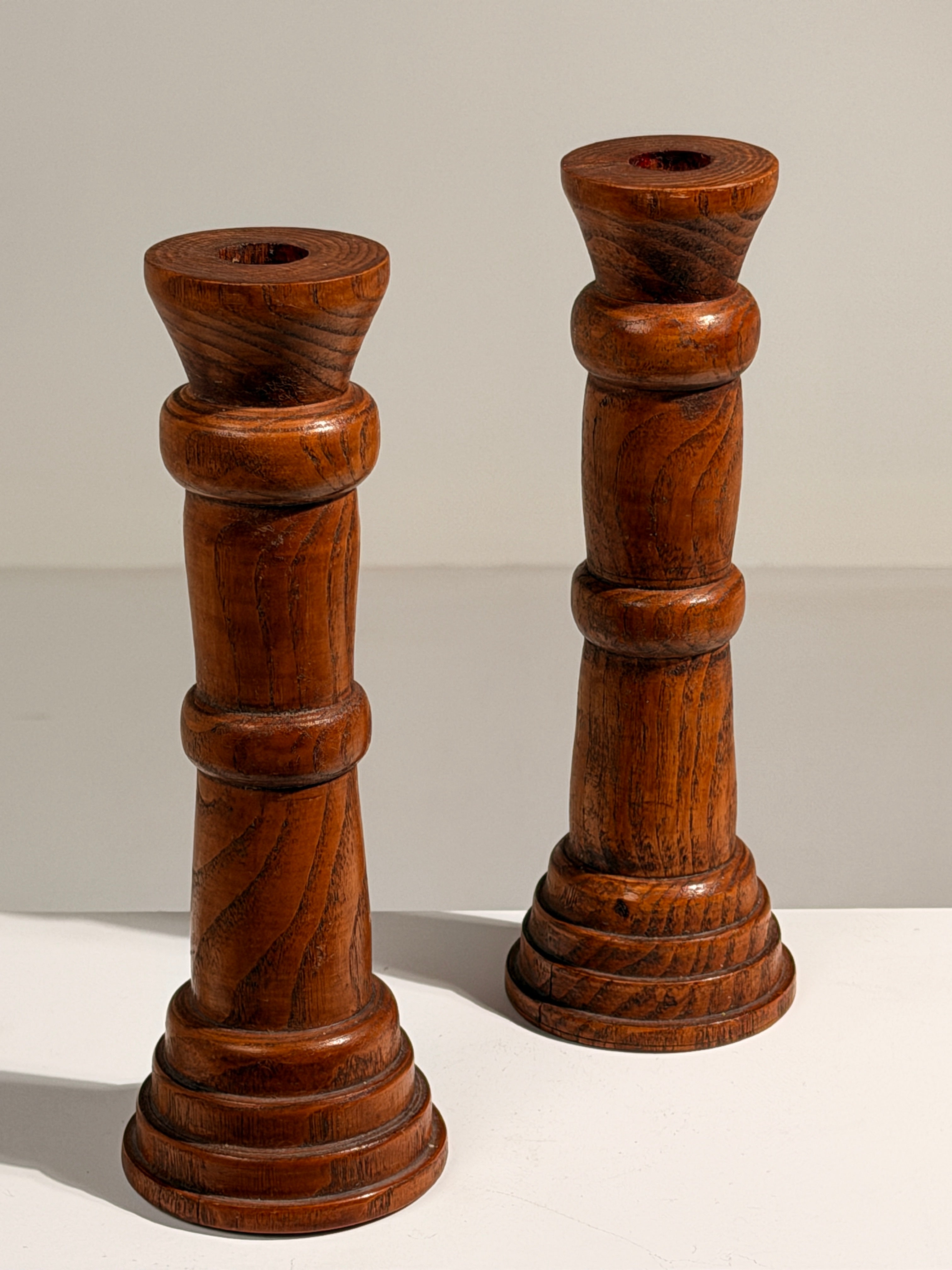 Pair of Brutalist solid wood candlesticks, France, circa 1960 — detail view