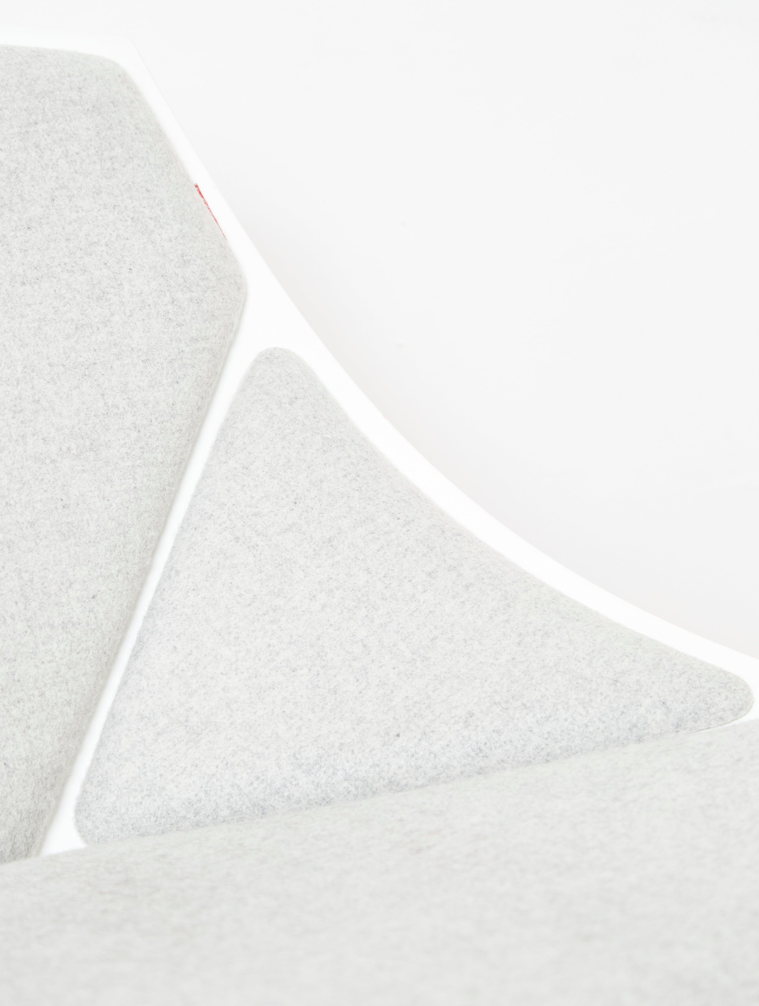 Jehs+Laub JL11 Space Lounge Chair for Fritz Hansen — close-up of light gray felt upholstery