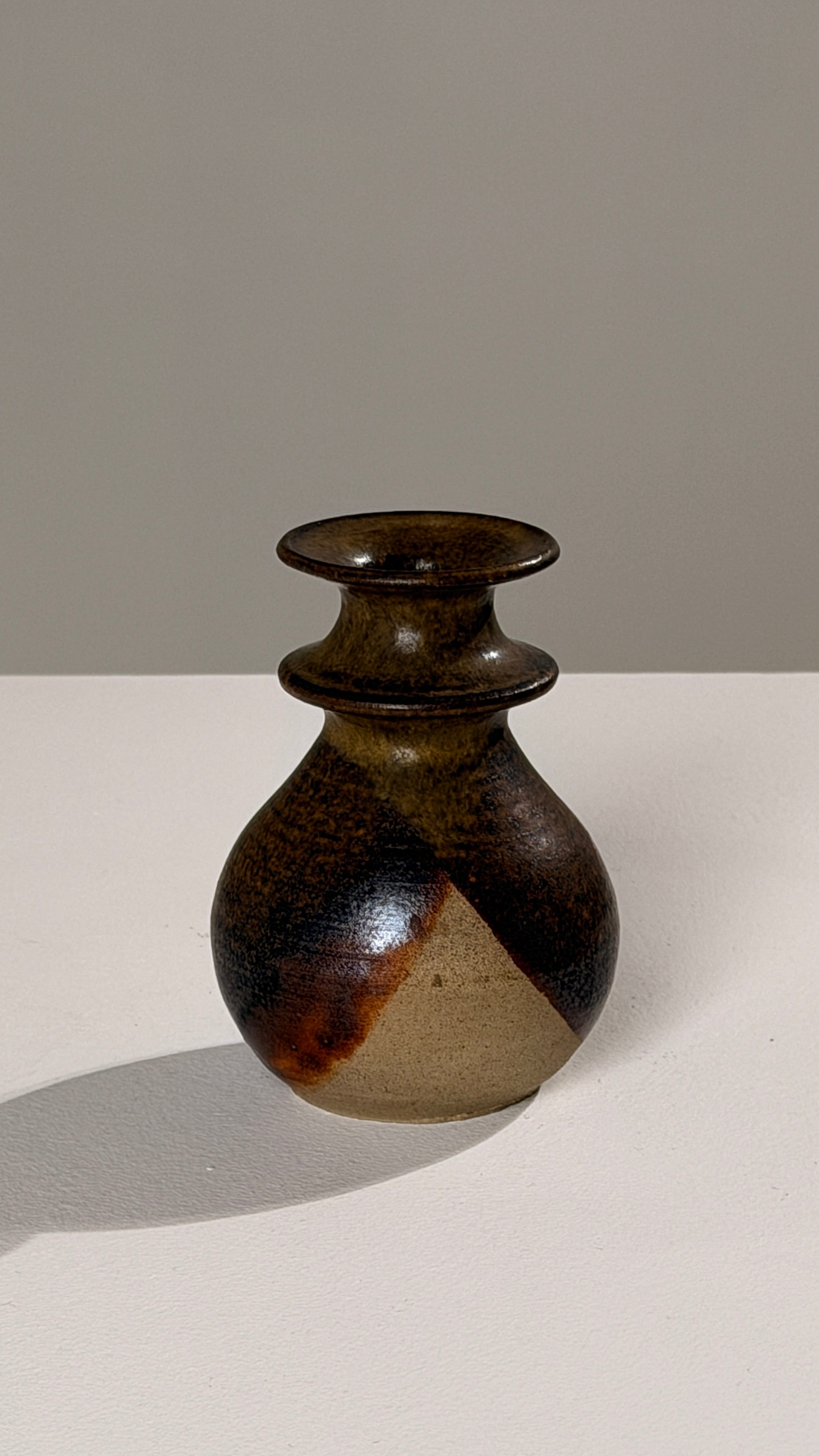 Stoneware Candleholder, France, circa 1960 — close-up showing earthy tones and texture