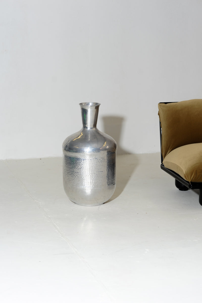 Hammered aluminum vase with textured band and narrow neck detail