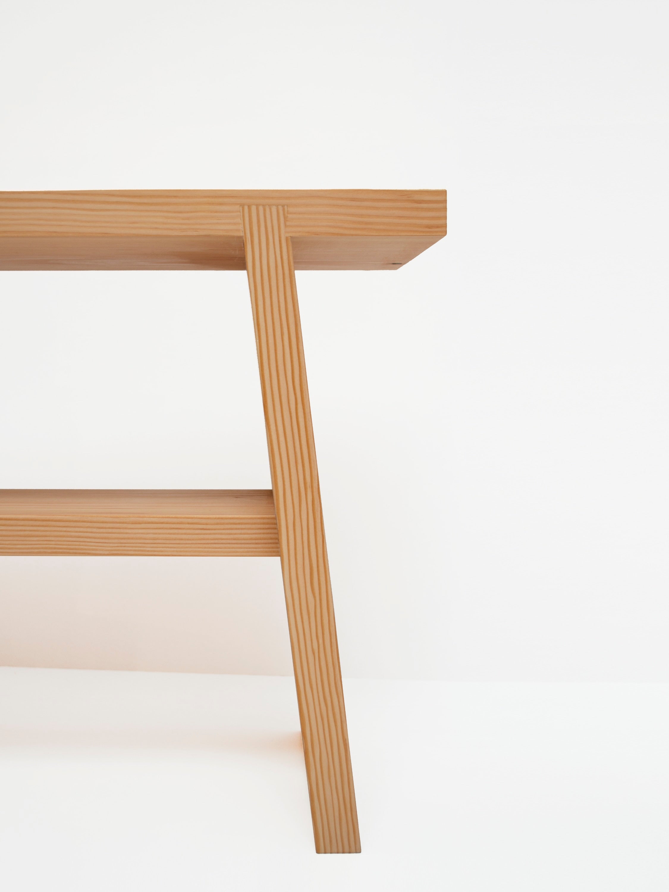 A' Bench — side view highlighting natural wood grain