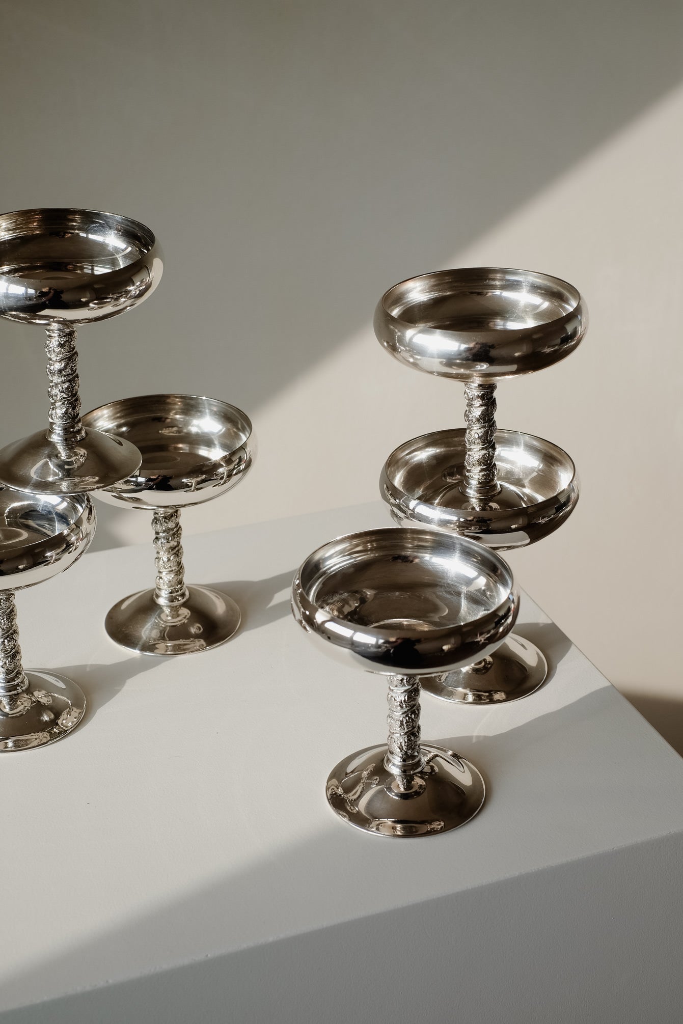 Set of 6 Silver Coupes — back view on white pedestal