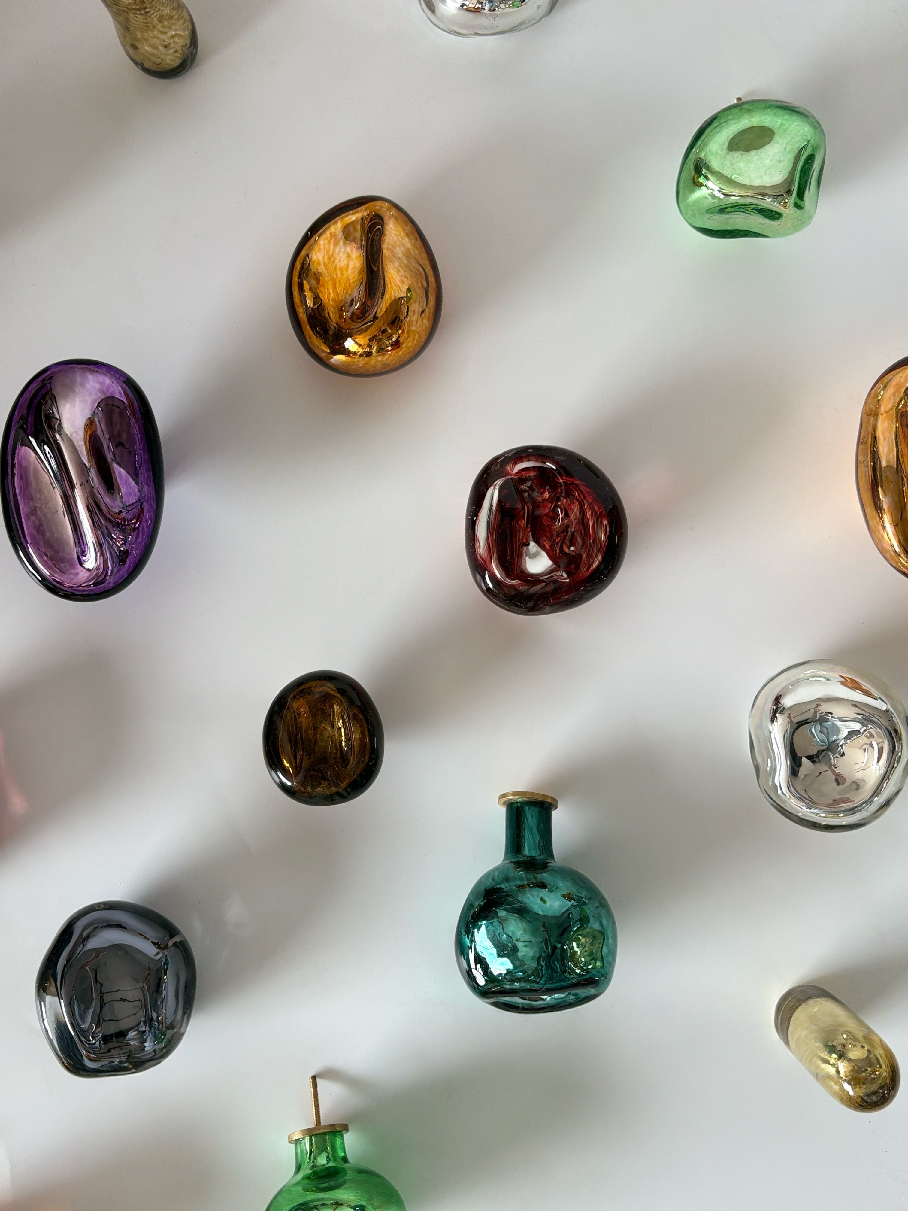 Knobs Collection Sculptures in Glass — top view of colorful glass shapes