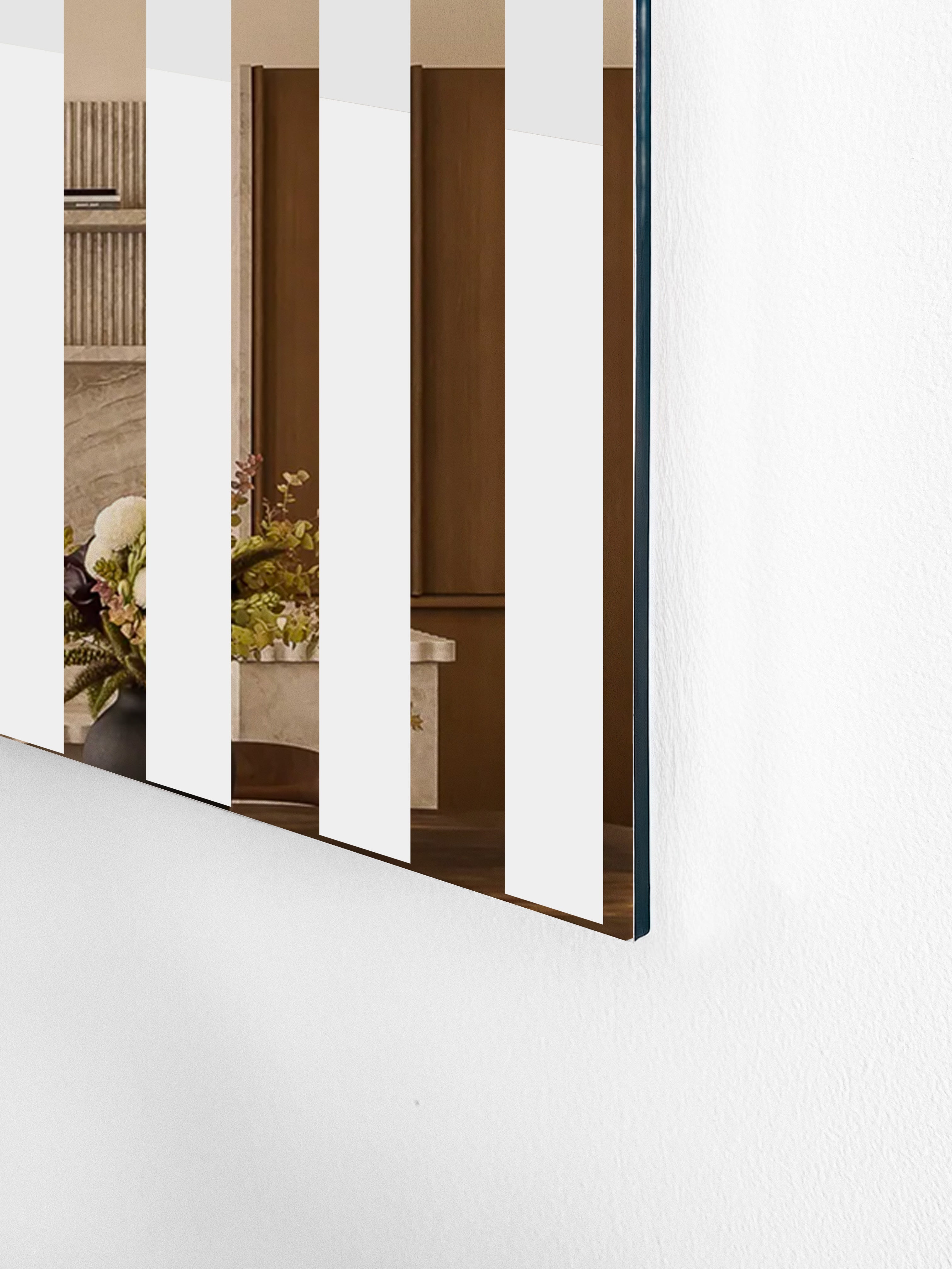 Mirrored Sculpture - BANDE DEUX 4 GRIS — side angle showing reflective surface in modern interior