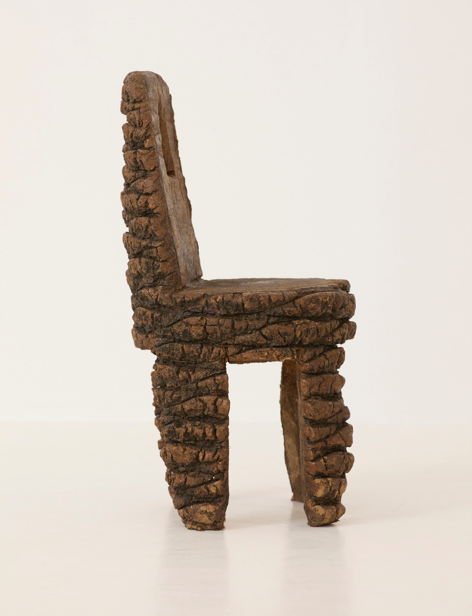 Small Artisanal Brutalist Chair in Solid Palm Tree C. 1970 — back view highlighting textured palm tree material