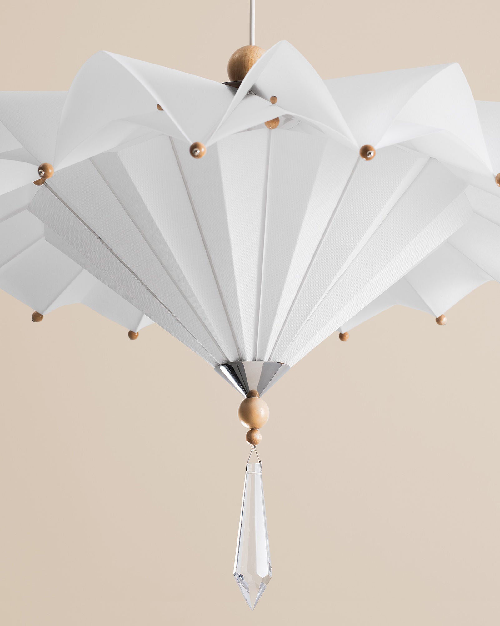 White fabric Harlequin pendant light with wooden beads detail