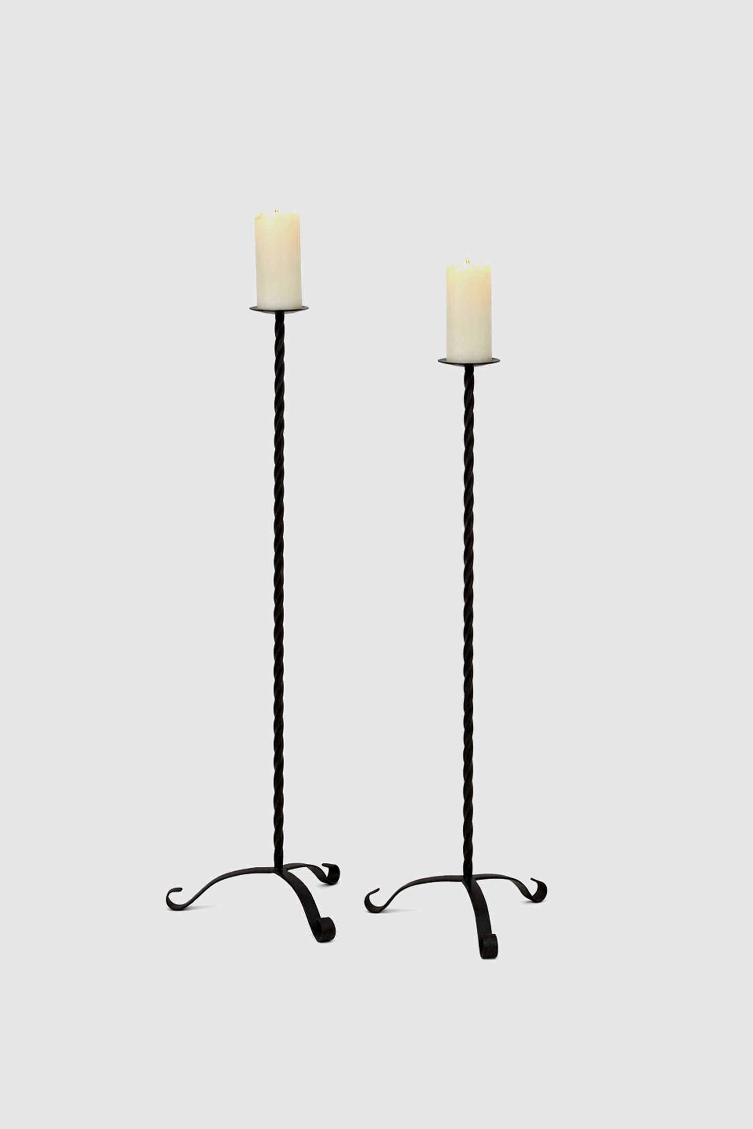 Twisted Iron Floor Candleholder Set — close-up of twisted black iron design