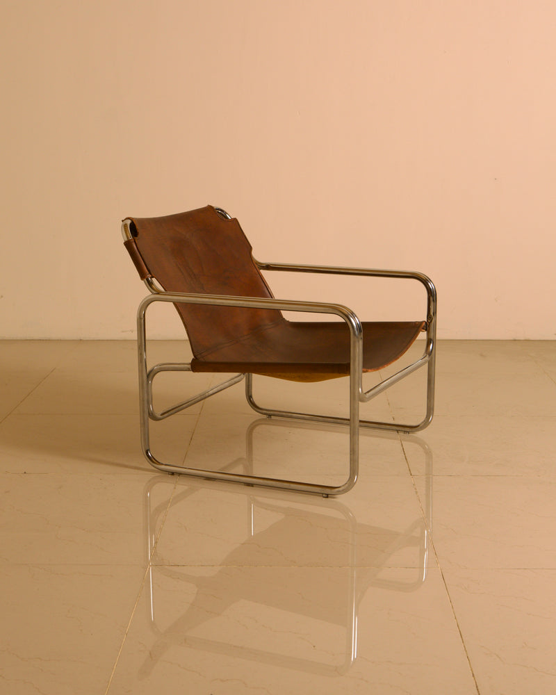 Chrome-plated steel and leather armchair by Antonello Mosca for Produzione Forma, 70s by Treaptyque | The Oblist
