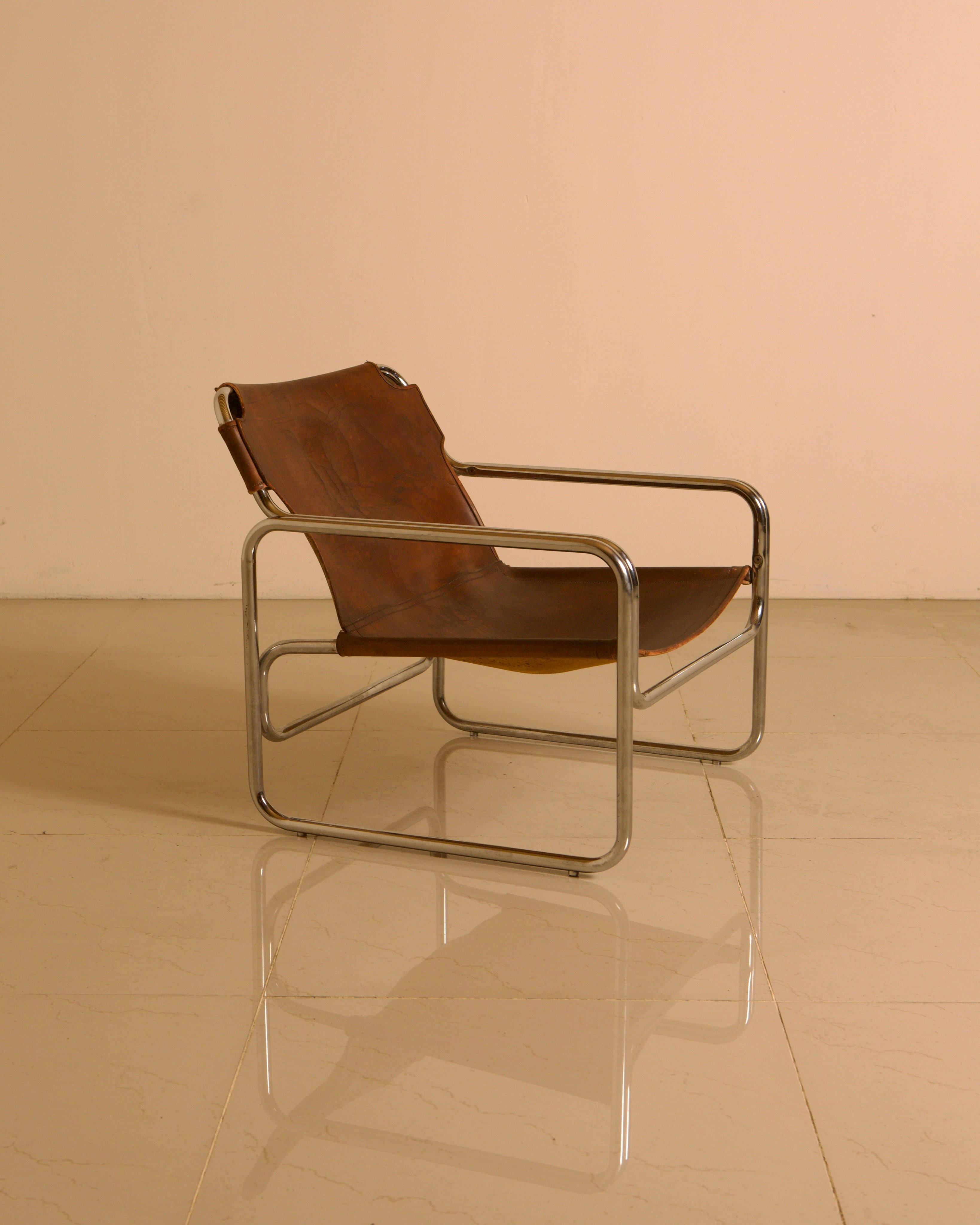 Chrome-plated steel and leather armchair by Antonello Mosca for Produzione Forma, 70s by Treaptyque | The Oblist