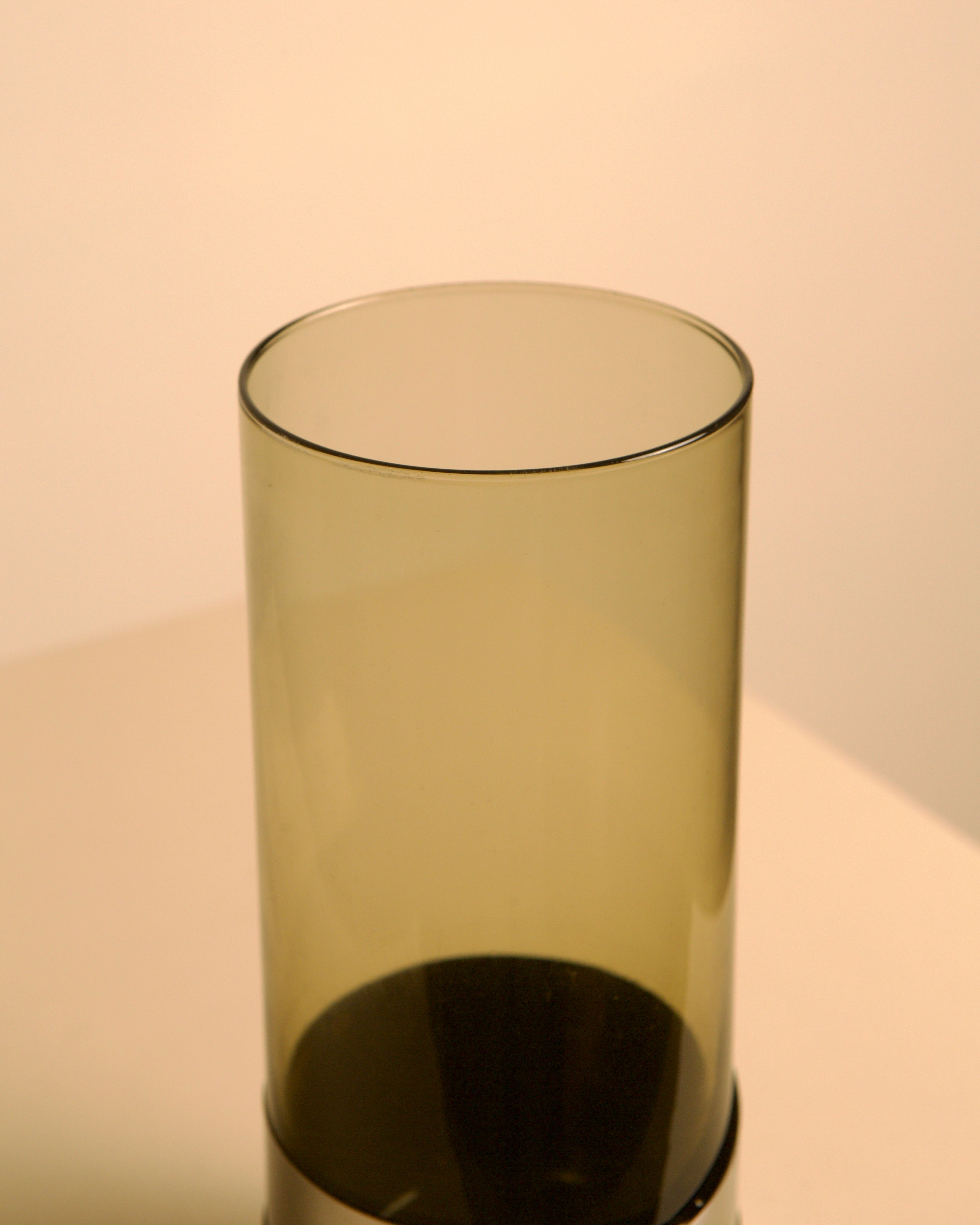 Italian Smoked Glass Vase, 1960s — angled view on neutral background