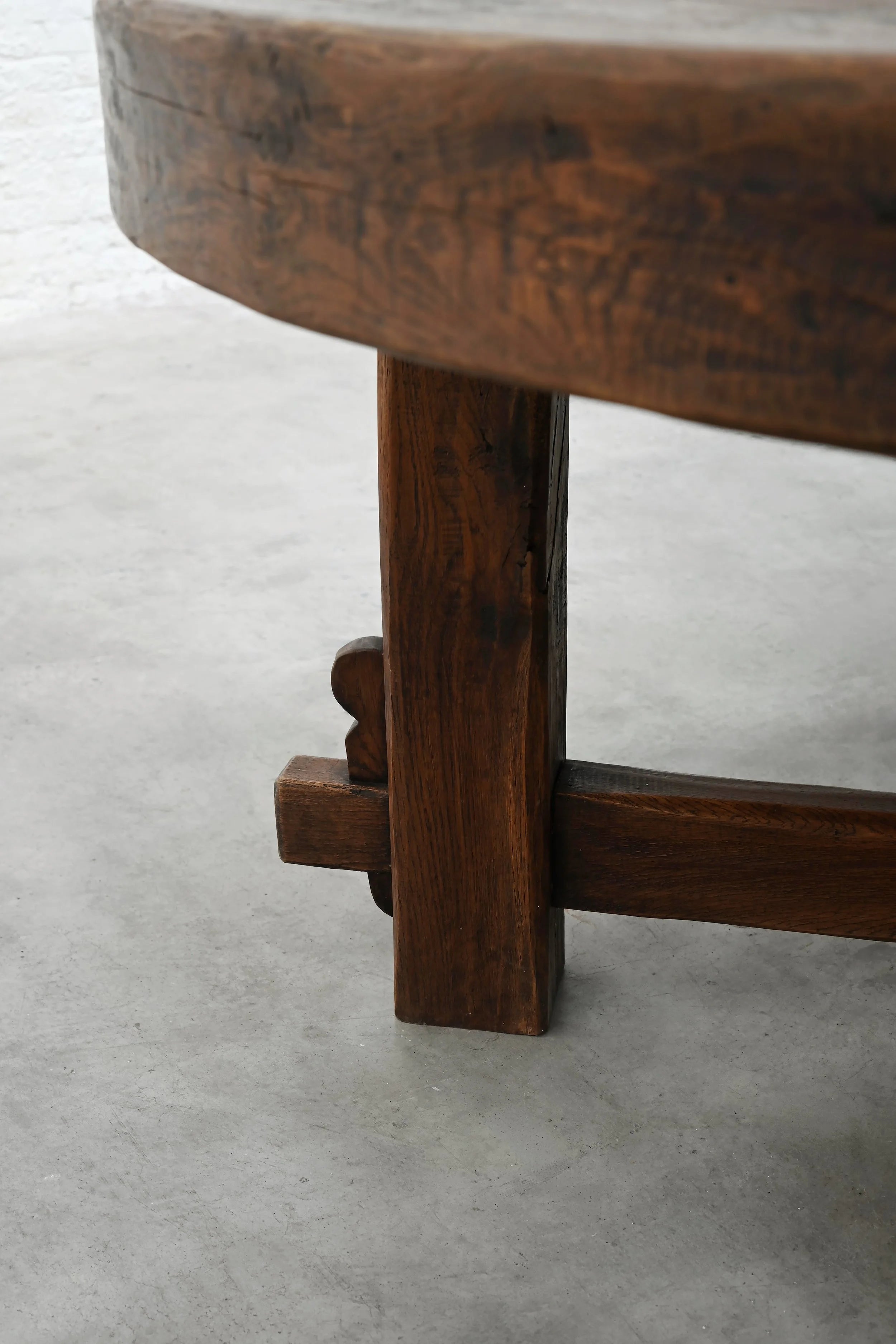 Rustic Wooden Dining Table, France 1920s — top view of dark wood grain and sturdy legs