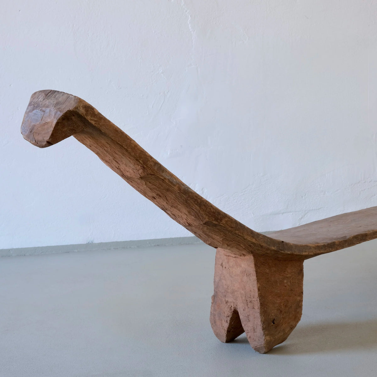 Primitive African Carved Wood Low Sculptural Bench | Vintage — side angle