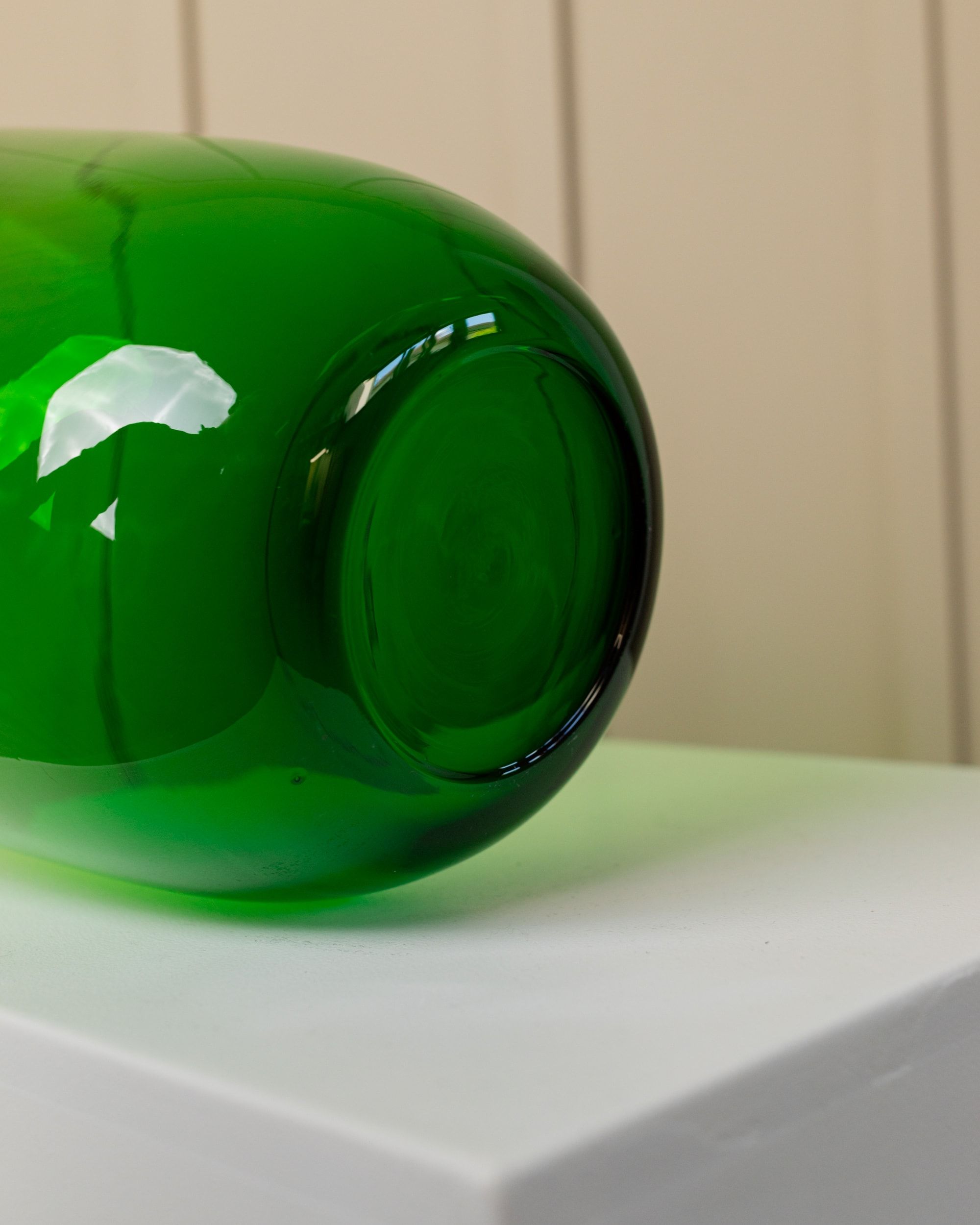 Green Glass Vase, 1990s - Maria Vinka for Ikea — close-up of base on white pedestal