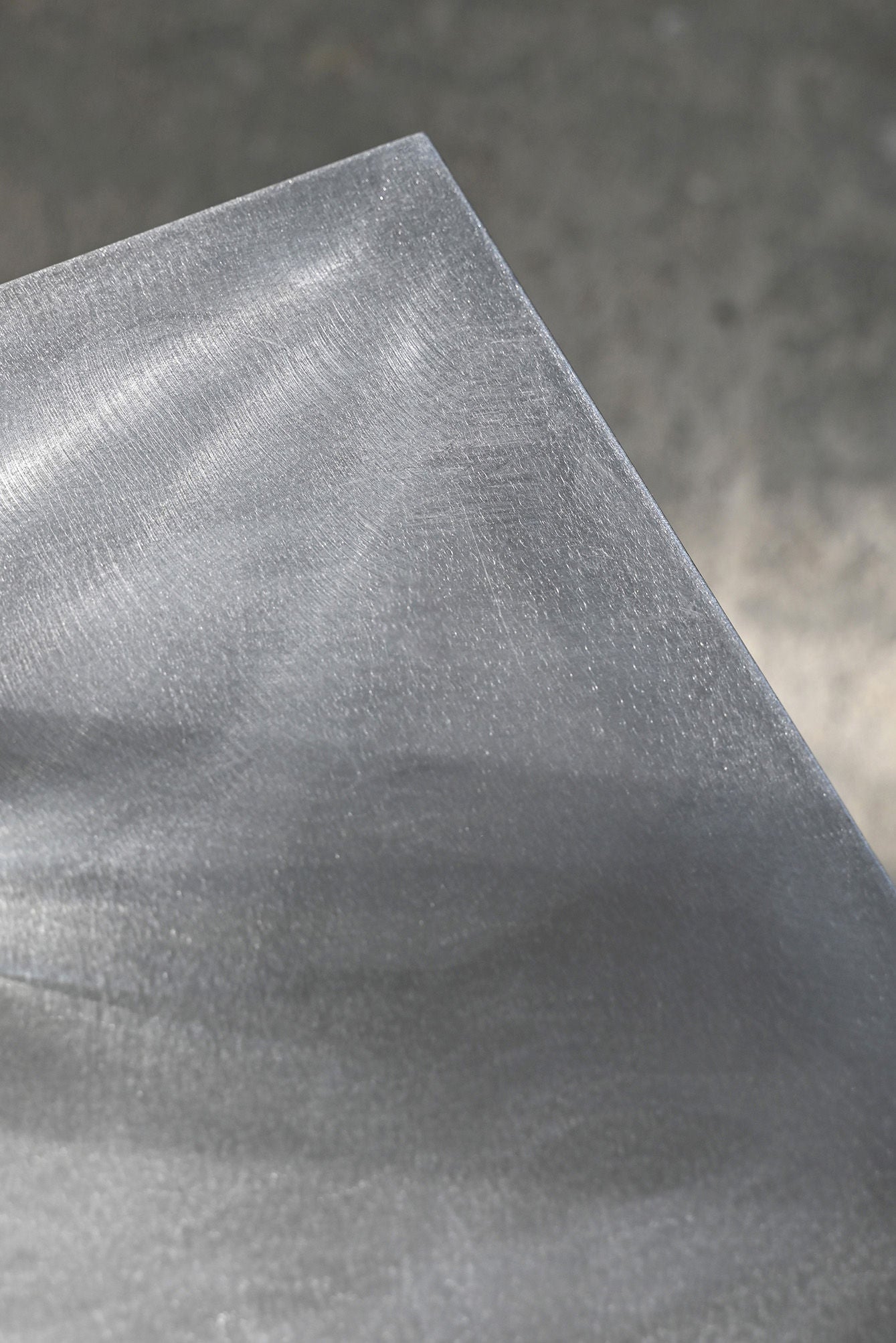 ZEN' Standing Shelf — top view of brushed metal surface