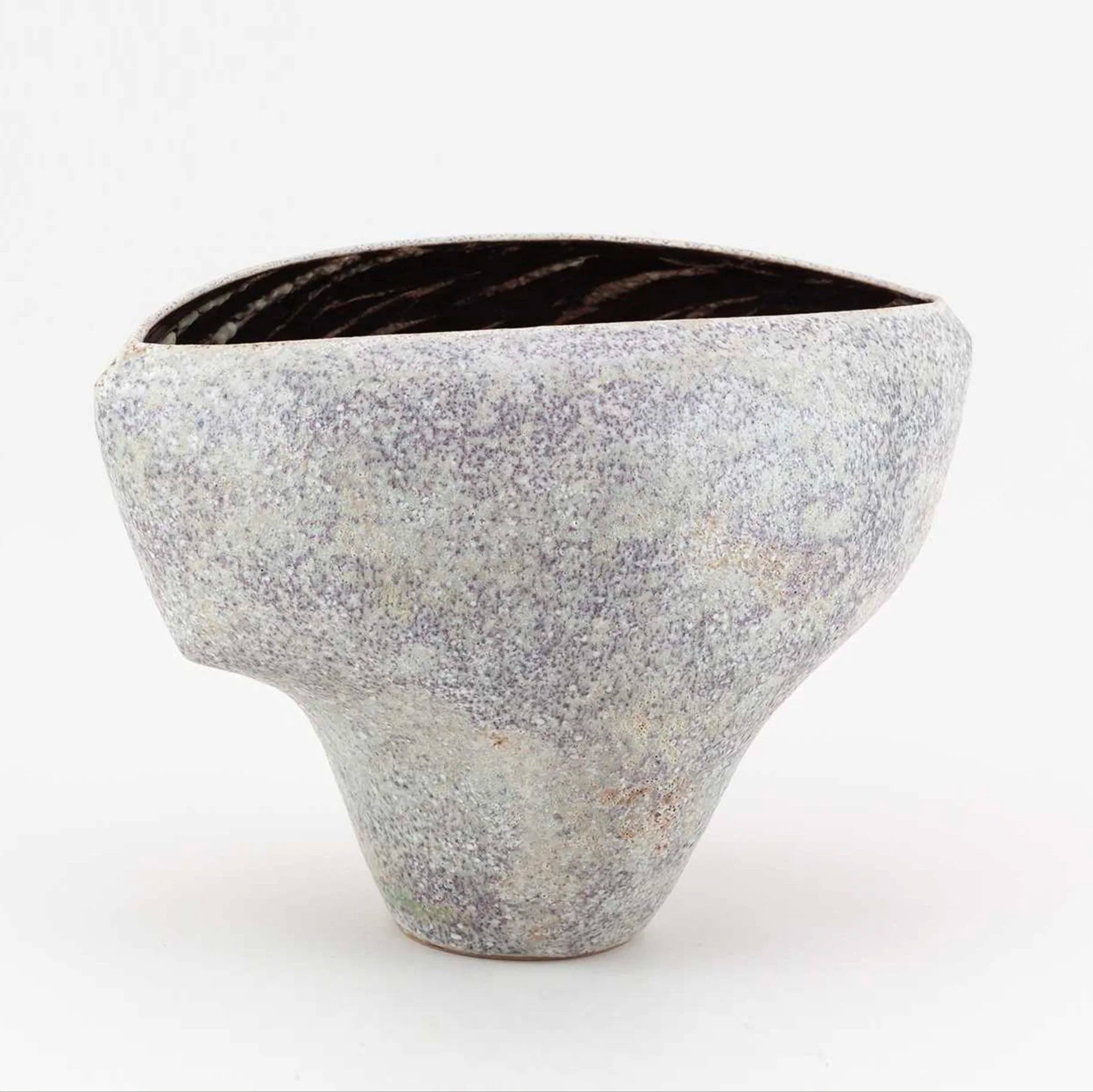 A Cloven Stoneware Bowl in Lilac and Grey Glaze by Chris Carter (B. 1945) — lifestyle setting