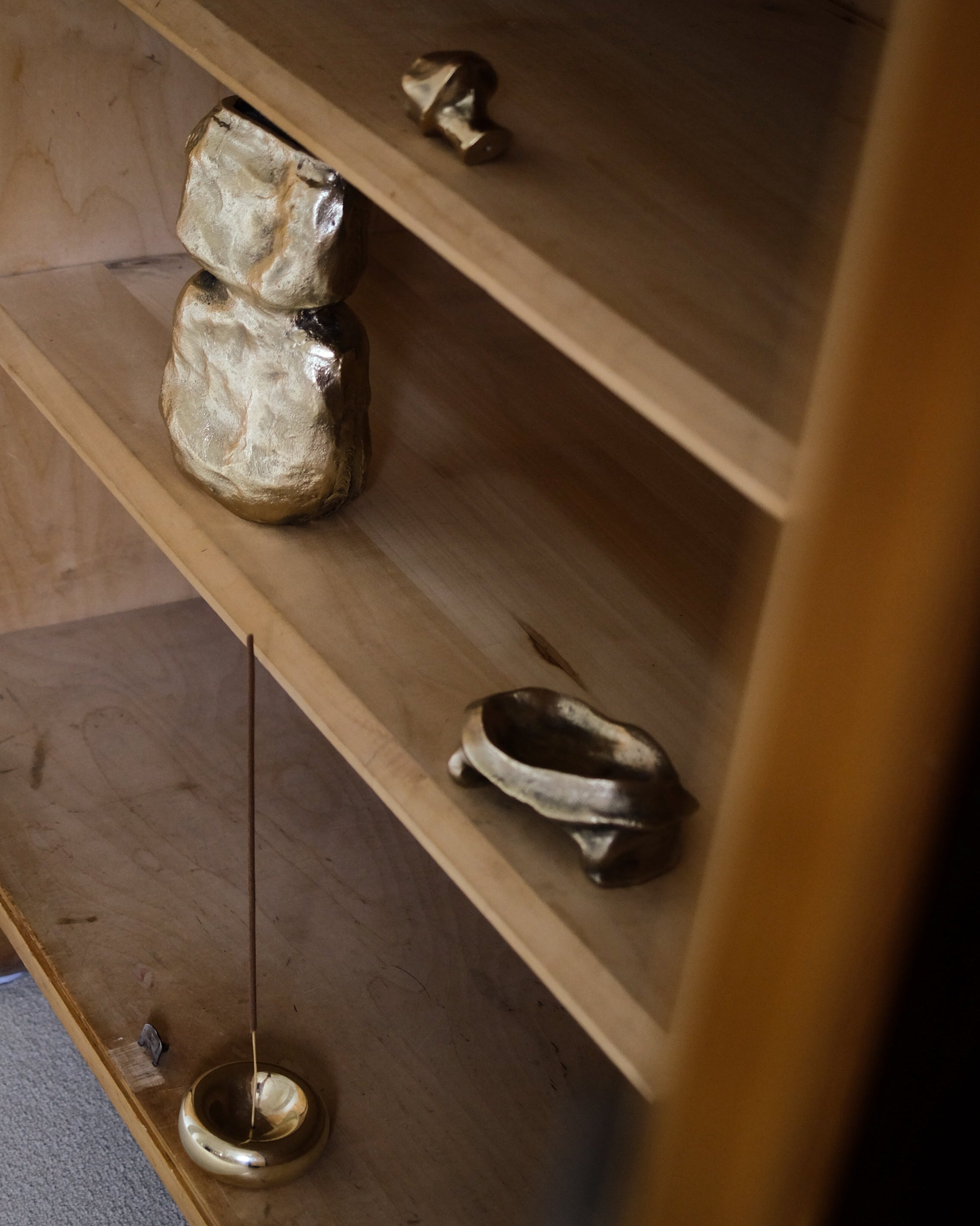 MOORE Tray/Catchall — top view of brass catchall on wooden shelf