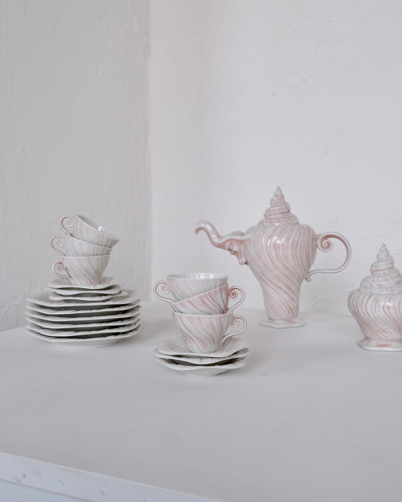 Porcelain Coffee Set "Rose Triton" by Arje Griegst for Royal Copenhagen, 1970s — close-up of stacked cups with pink swirls