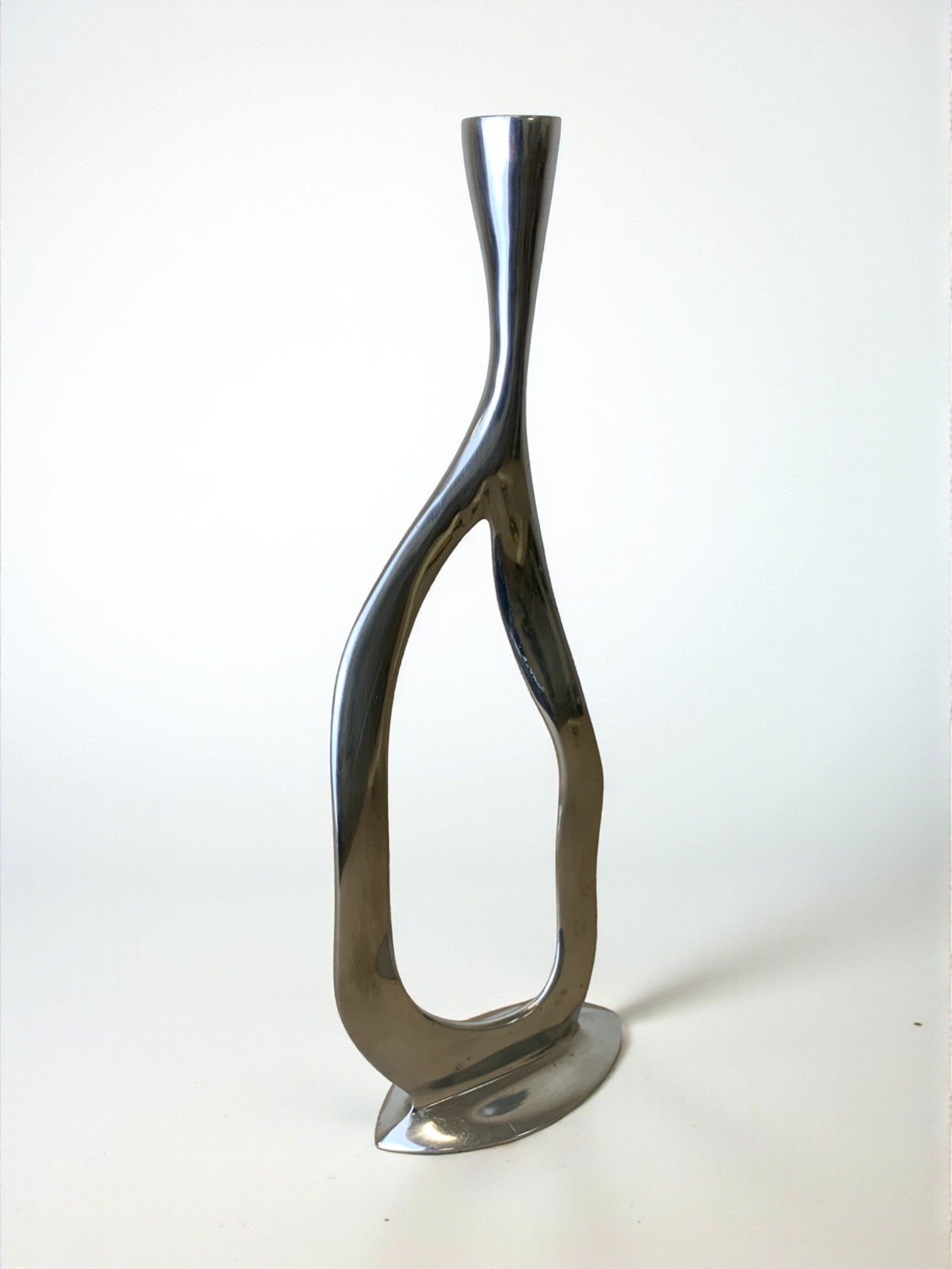 Biomorphic candleholder, solid aluminum, 1970's — side angle