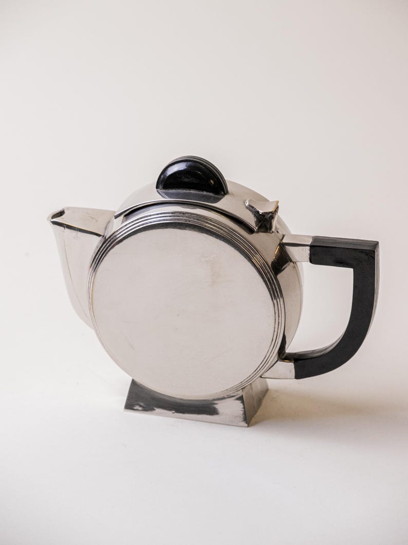 Art Deco Silver Plated Teapot — side angle showing polished silver finish
