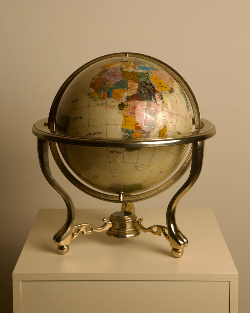 Large Globe Made of Hardstone and Mother-of-pearl, 1970s — close-up of globe with metallic stand