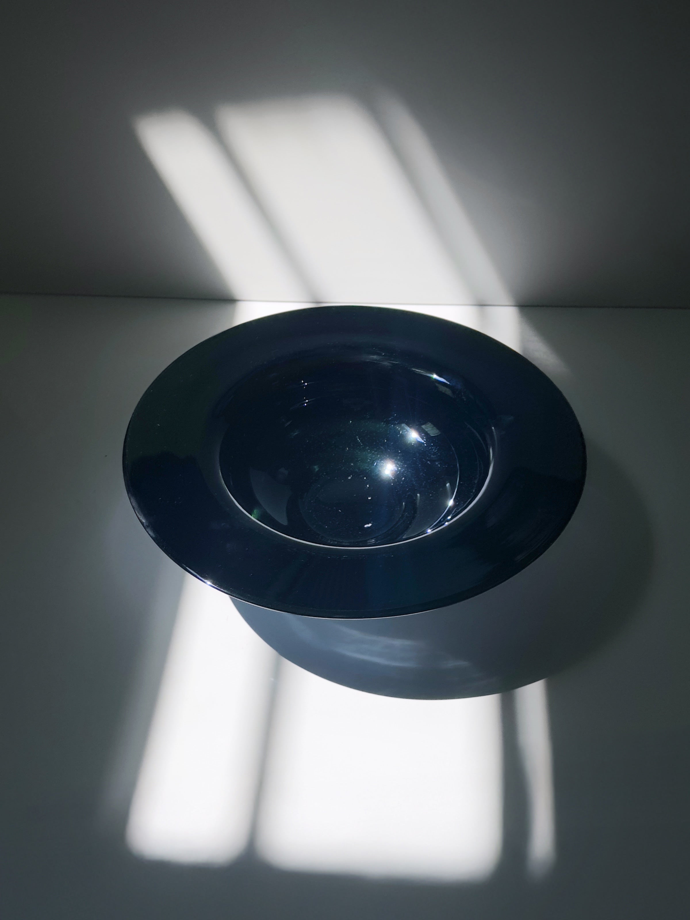 Italian blue/black iridescent bowl - 1980s — side angle