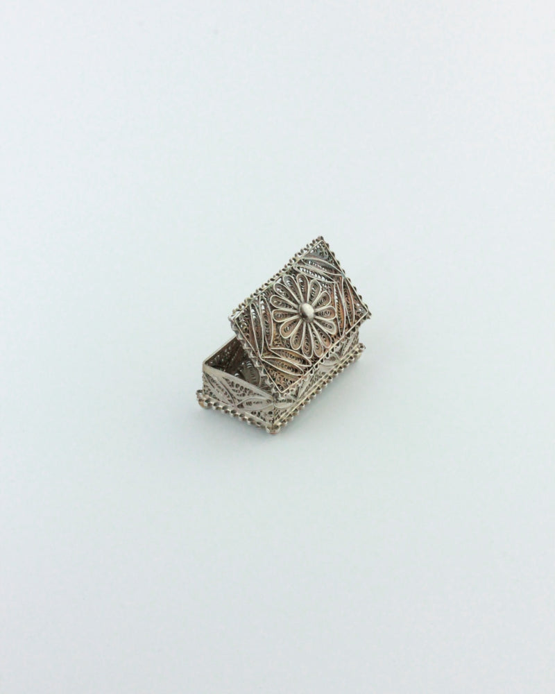 Silver Pillbox — close-up of ornate silver design with open lid