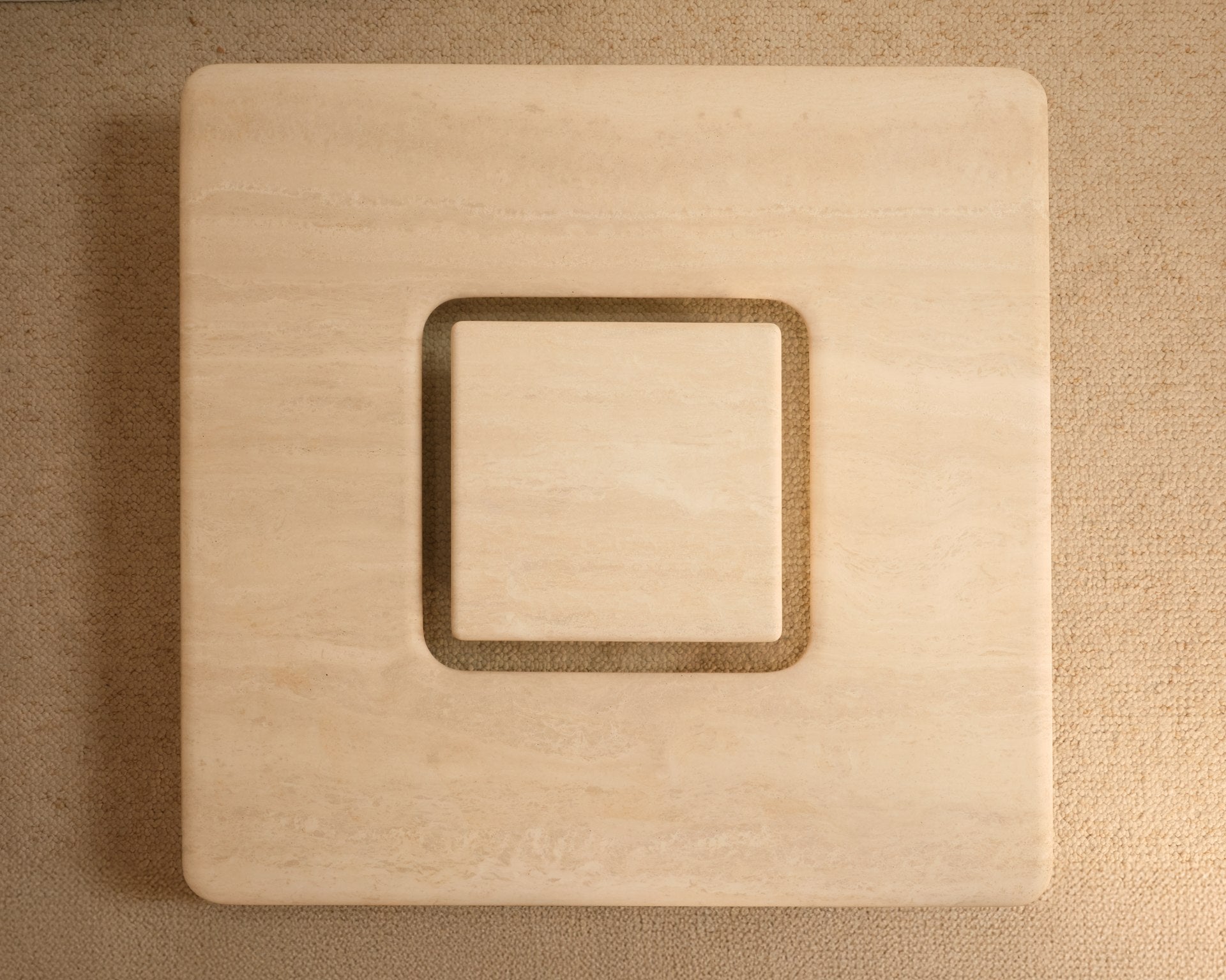 Saturn Travertine Coffee Table — in context