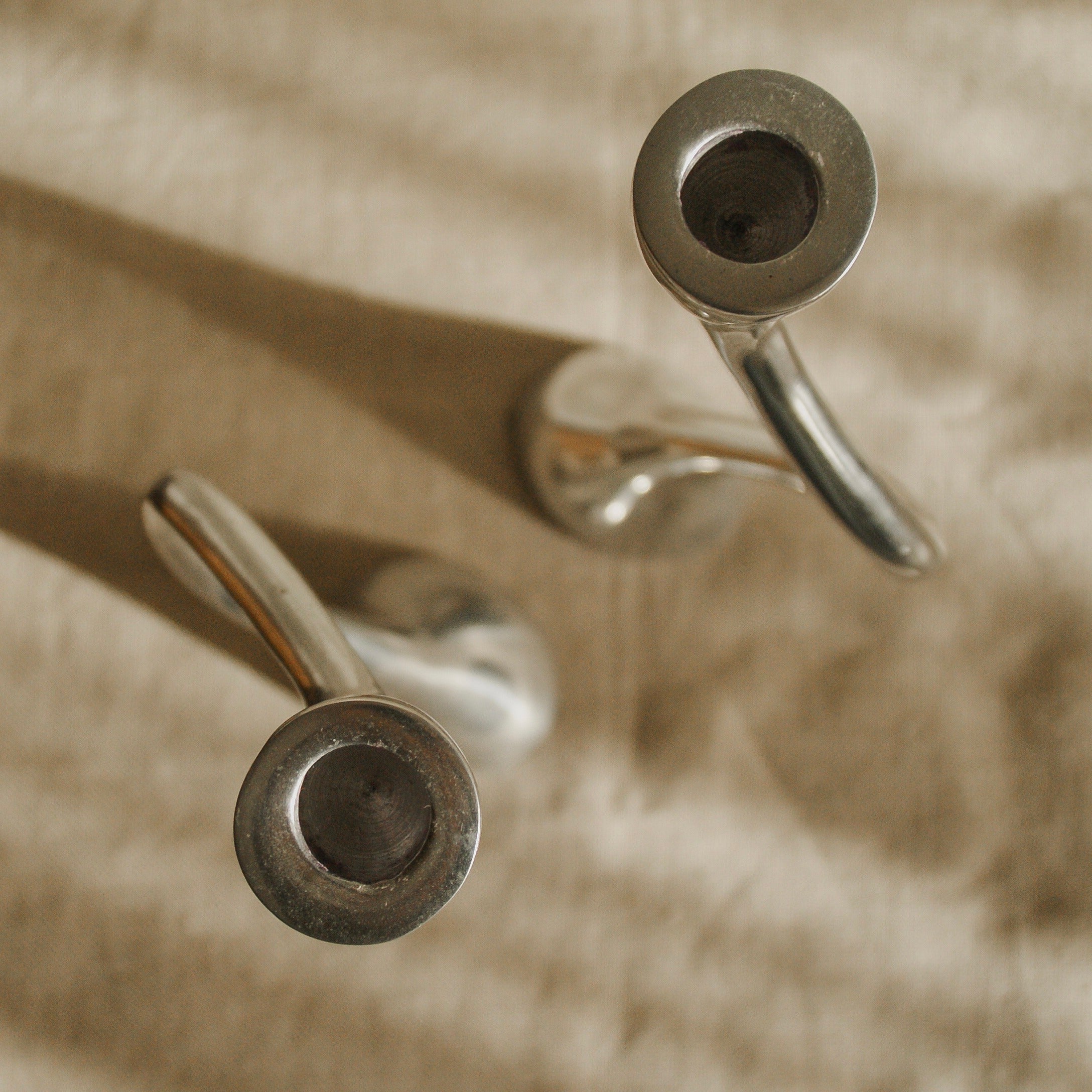 Pair of Curvy Candle Holders — side angle